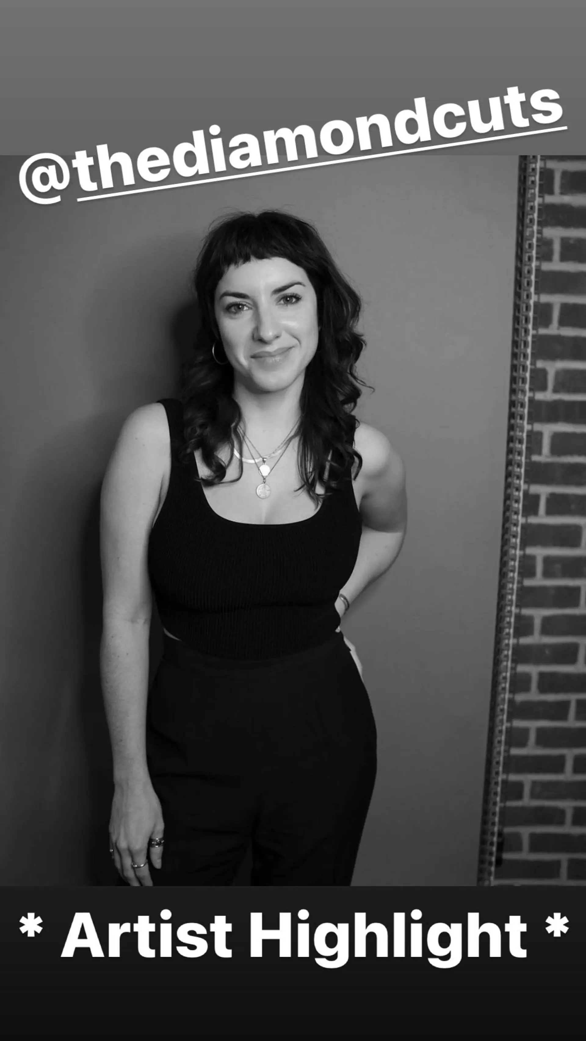 A medium-length shag haircut with baby bangs and layers for a textured, wavy look. 1