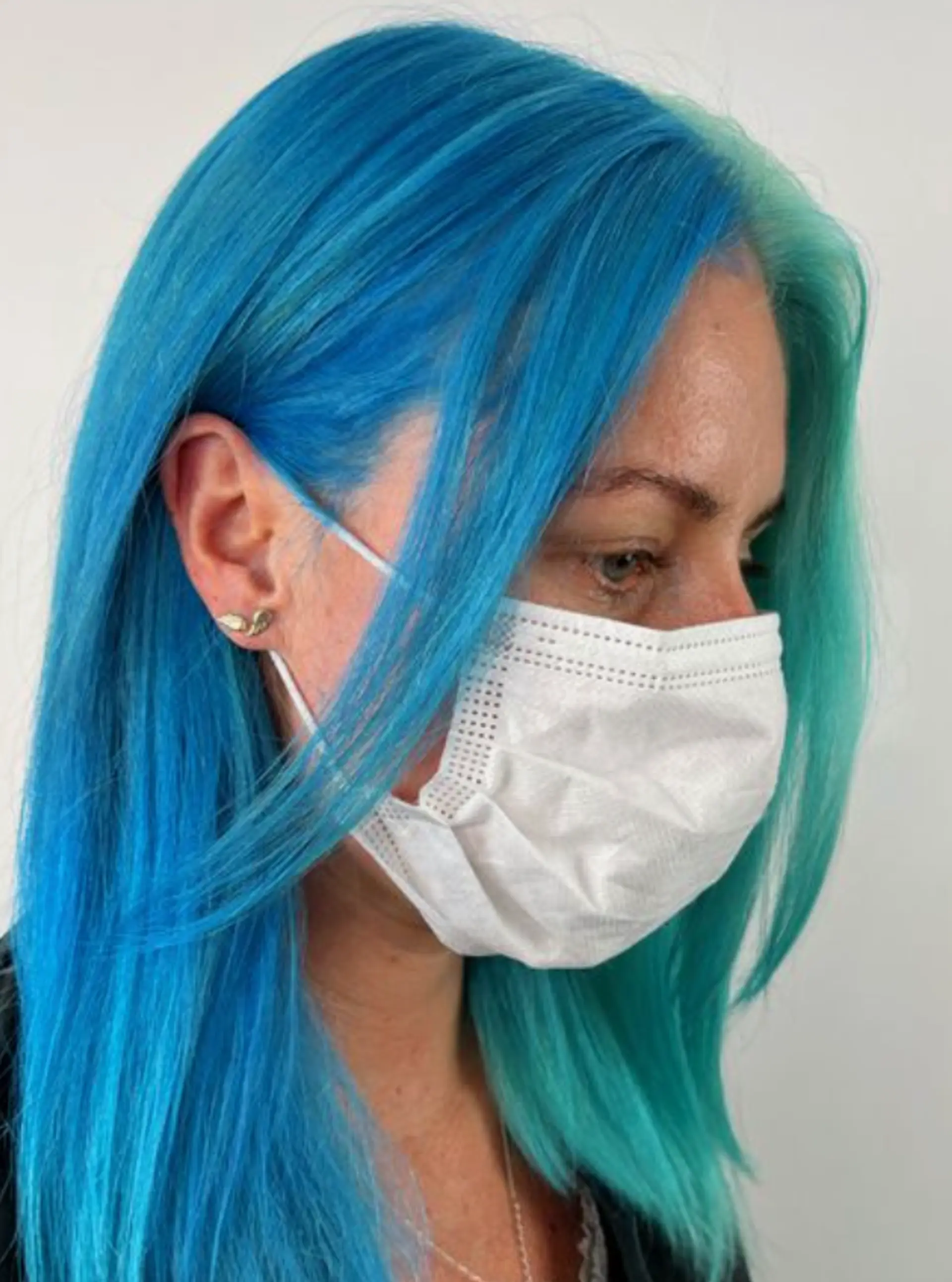 Long, straight hair with a dual-tone color effect, turquoise on the left and deep blue on the right, creating a vibrant and sleek look. 3