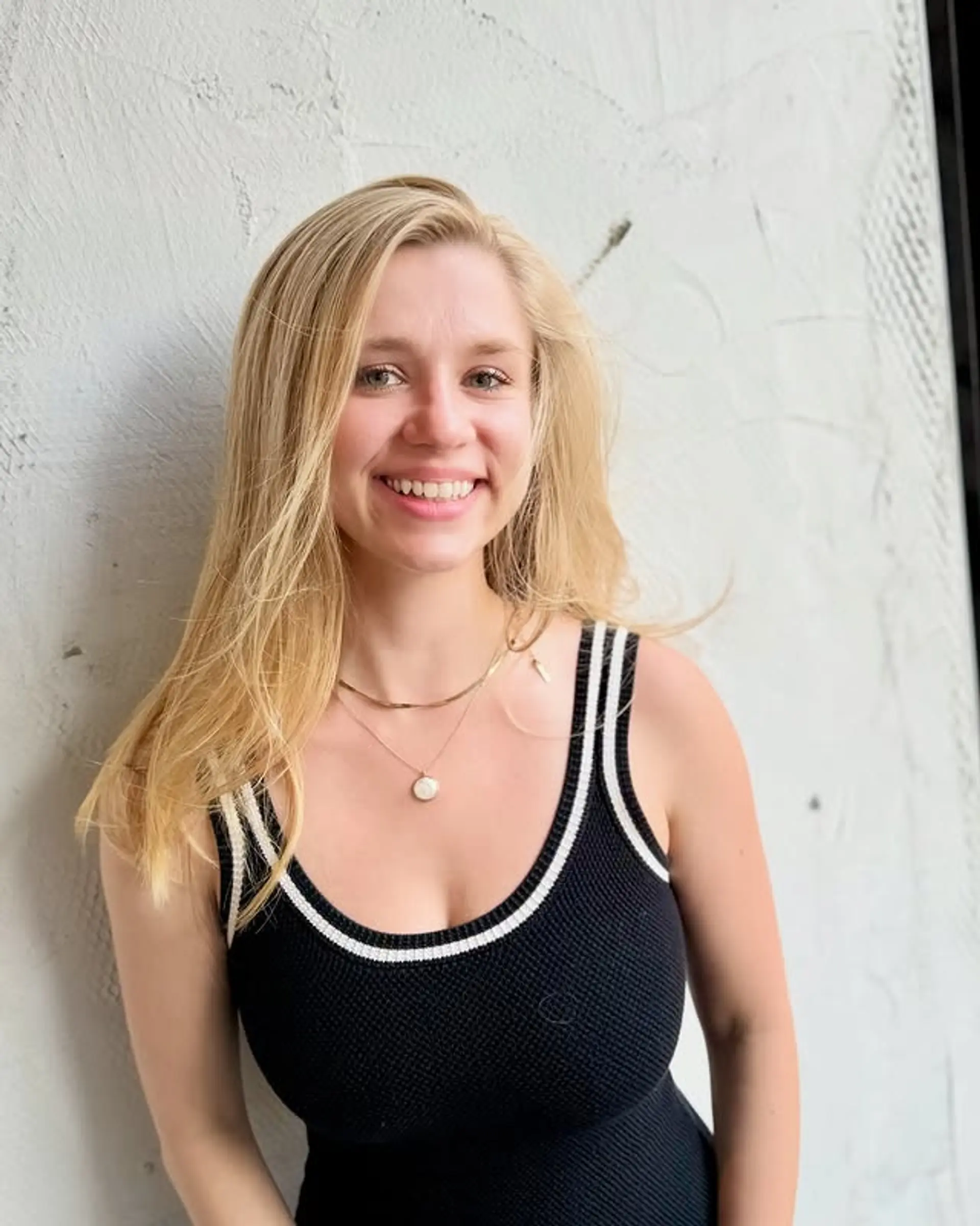 Long layered hairstyle with face-framing layers for added movement and shape. 1