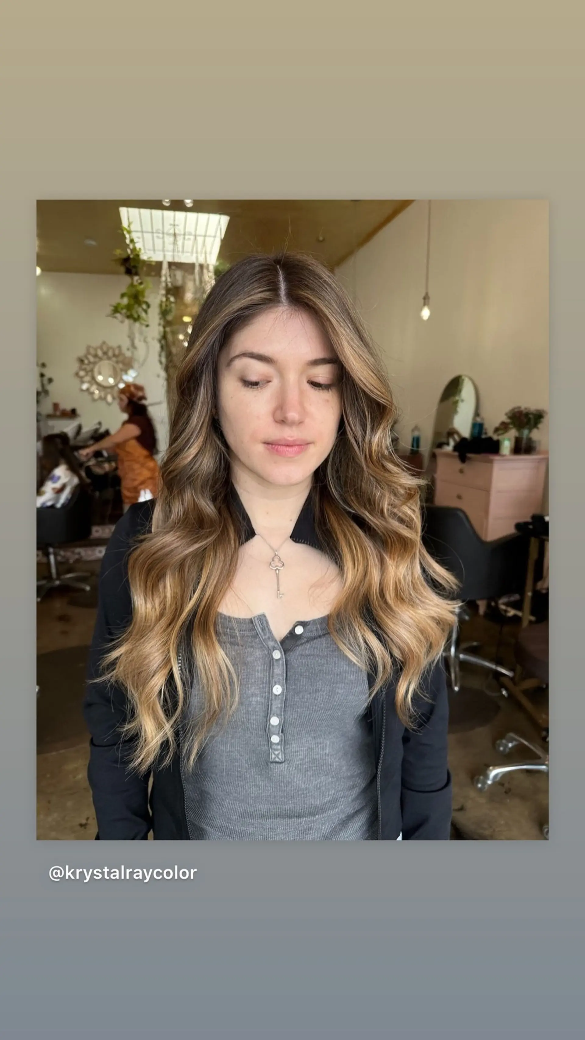A long, wavy balayage style with caramel and blonde highlights. 1