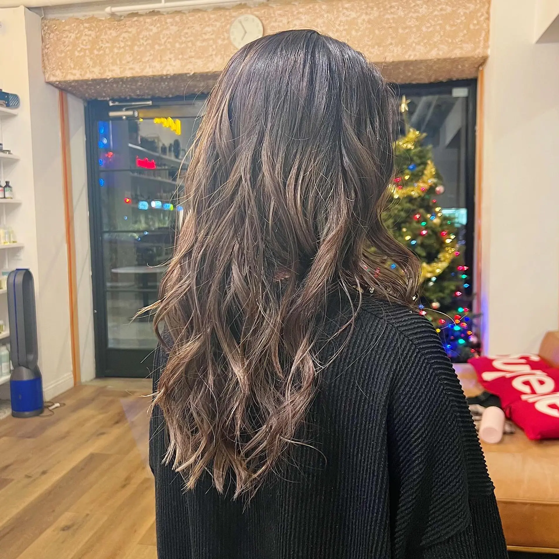 Long, layered waves with a balayage color melt. 2