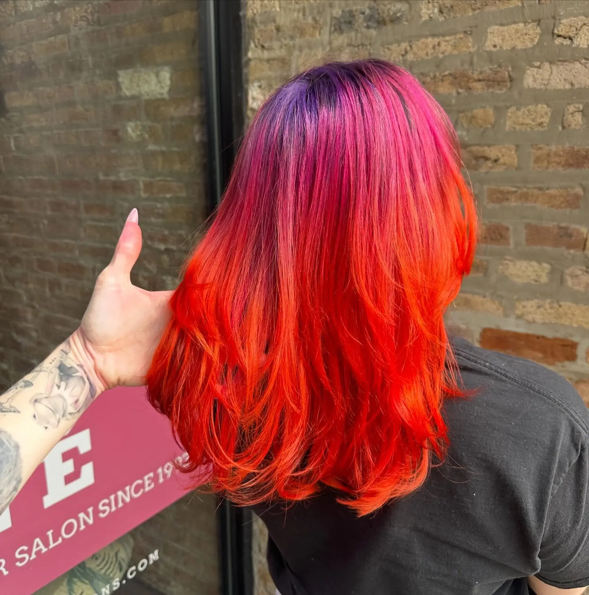 A medium-length shag with a vibrant sunset ombre effect. 1
