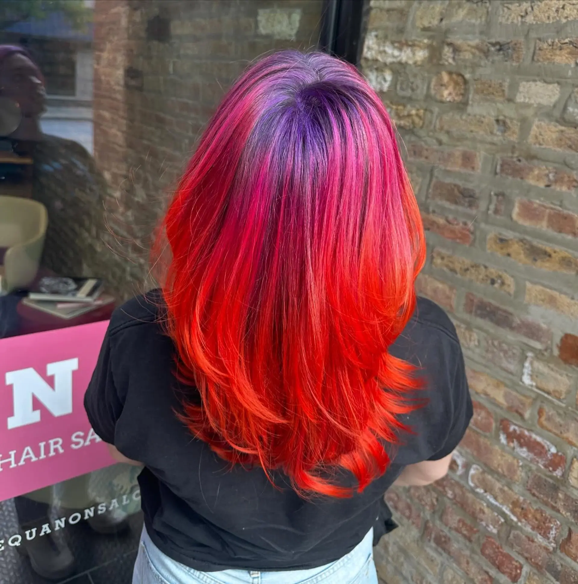A medium-length shag with a vibrant sunset ombre effect. 3