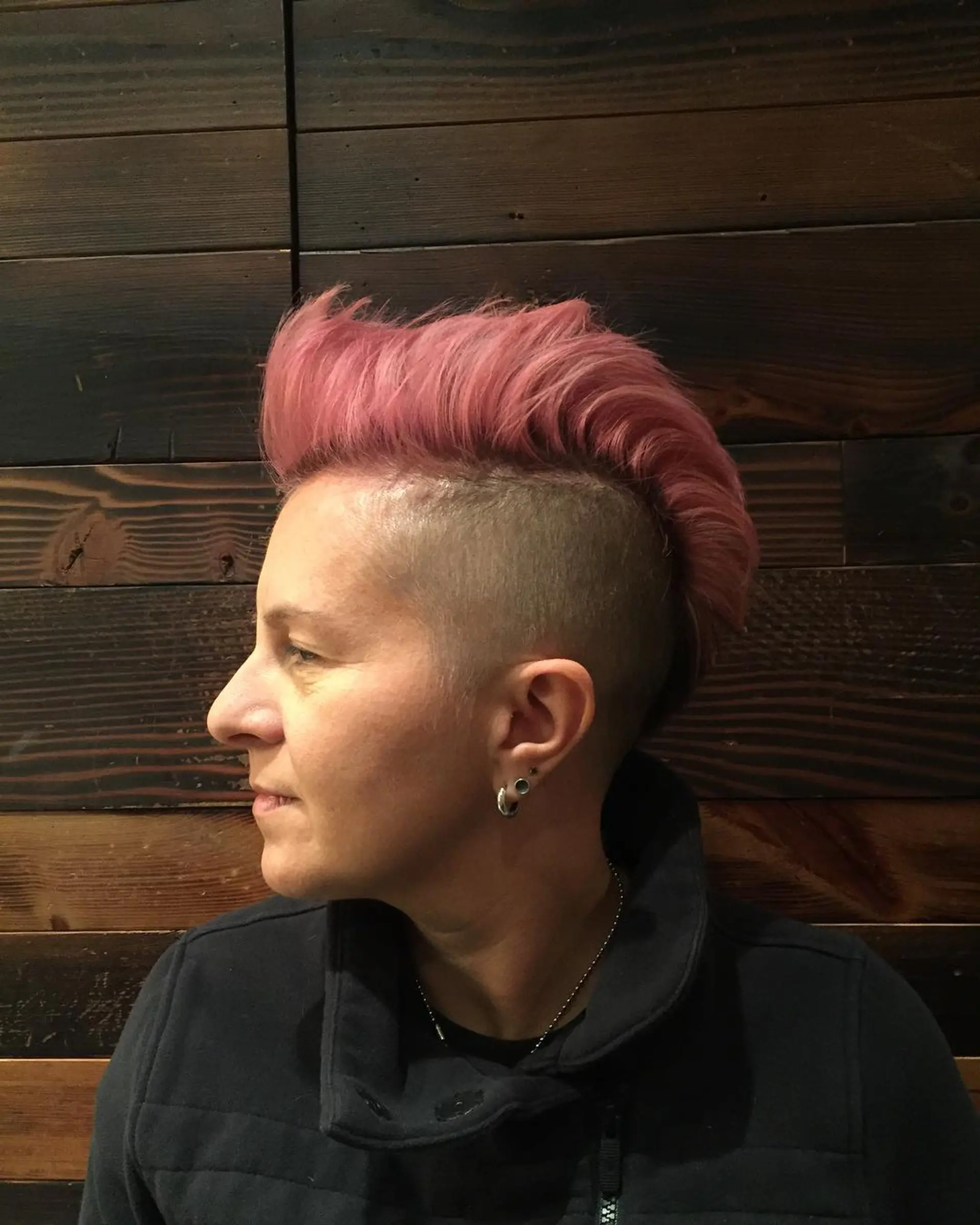 A pink mohawk with an undercut fade on the sides. 1