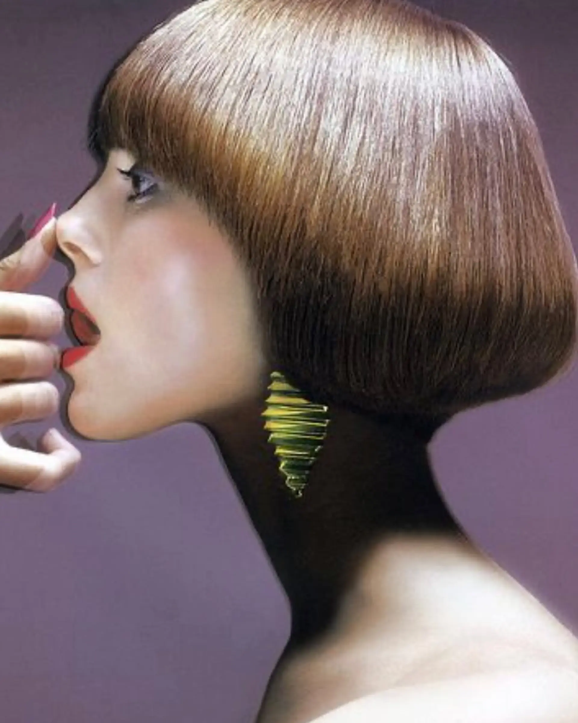 A sleek, geometric precision bob with a curved blunt fringe and perfectly sculpted rounded lines. 1