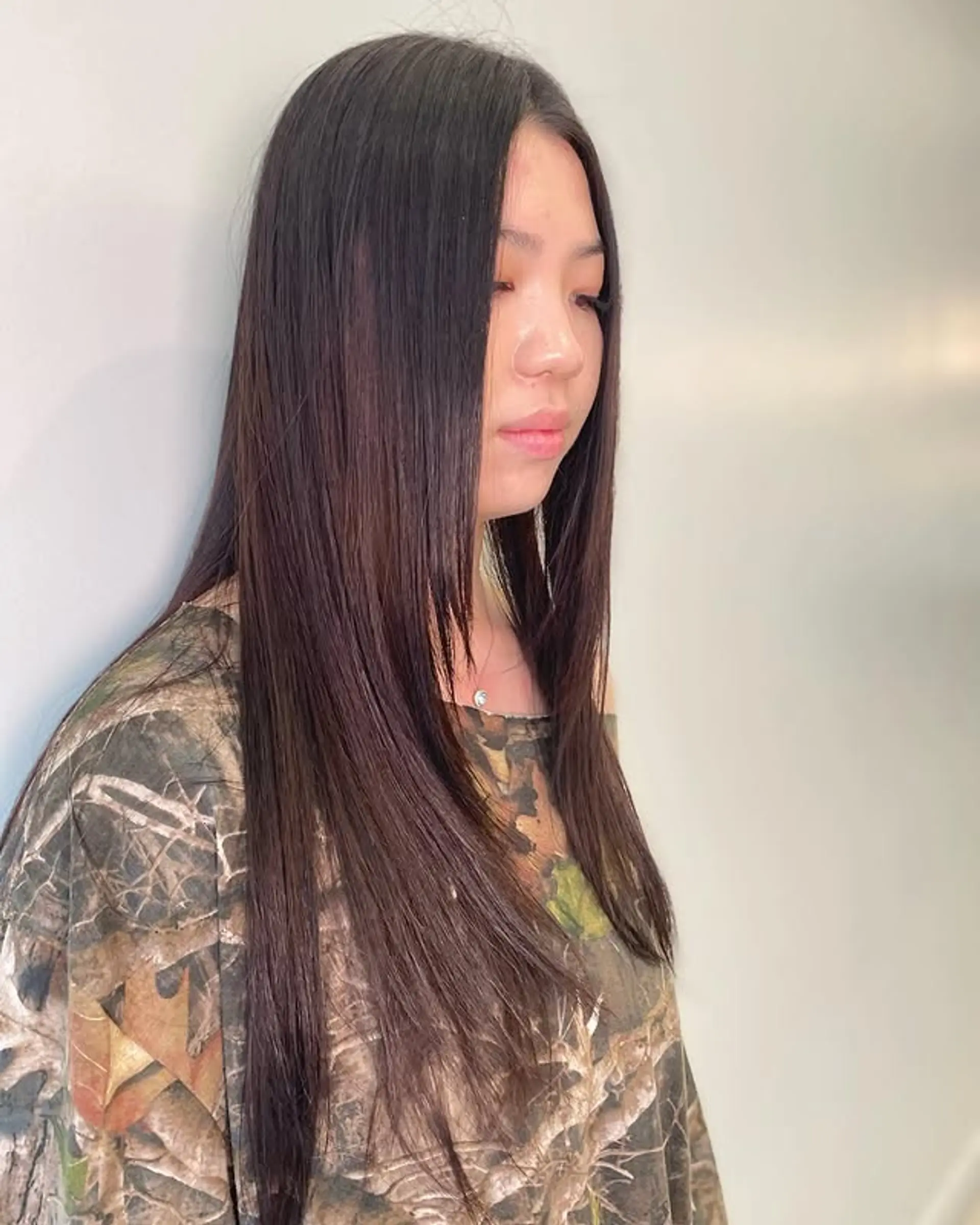 Long, straight, and sleek hairstyle. 1