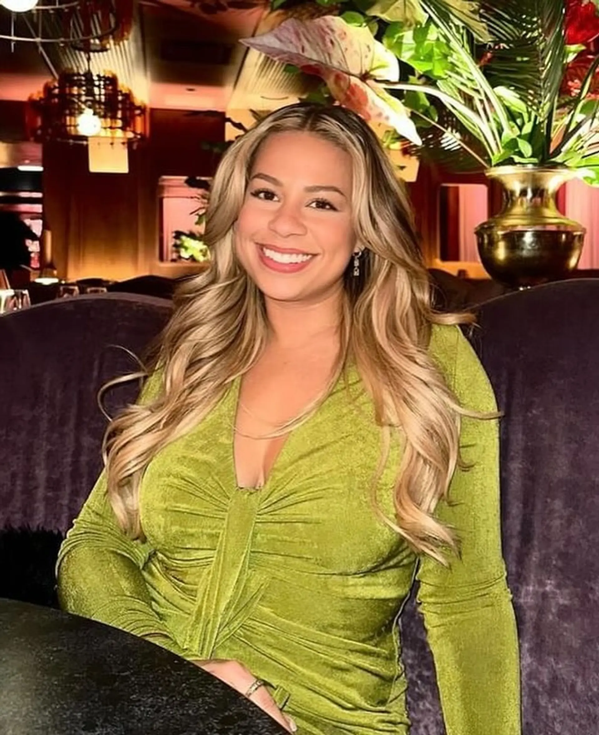 Long, soft waves with a golden blonde balayage and face-framing layers. 1