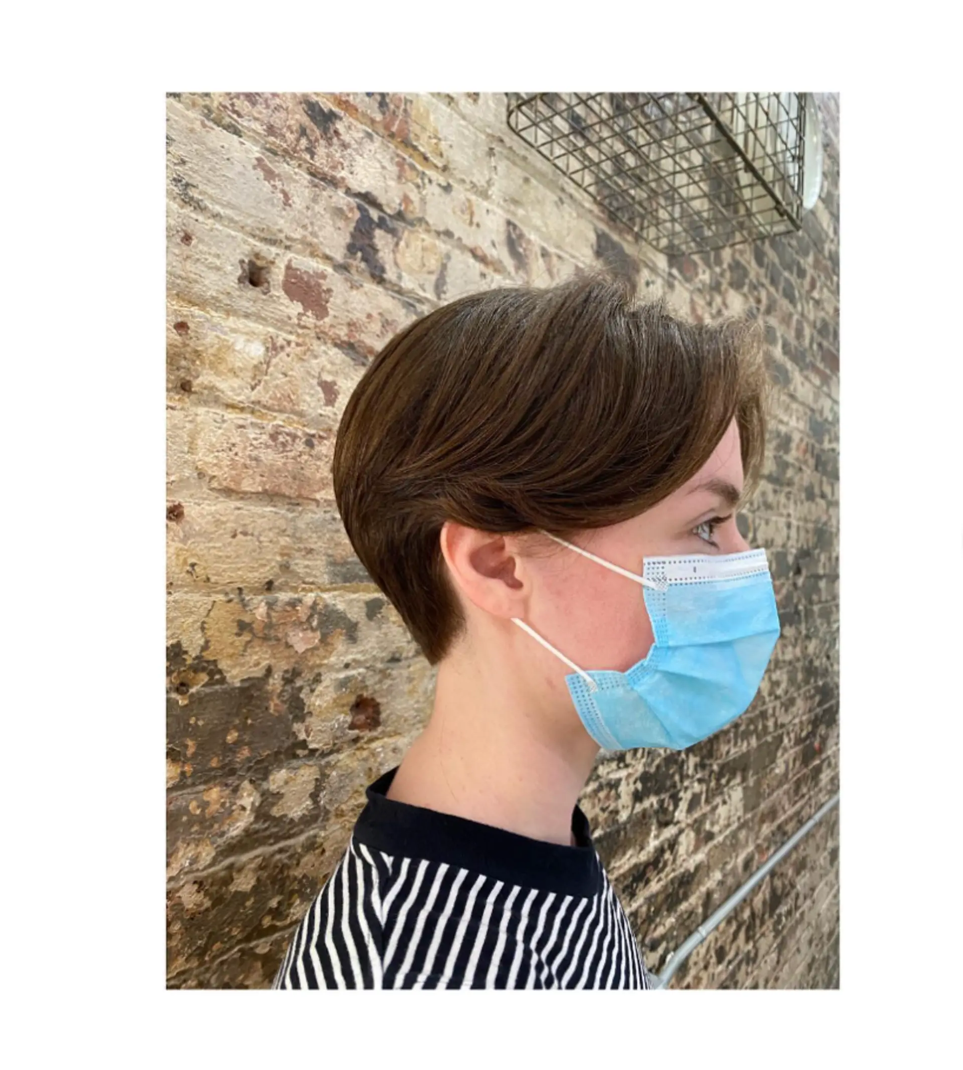 A short pixie cut with layered styling. 1