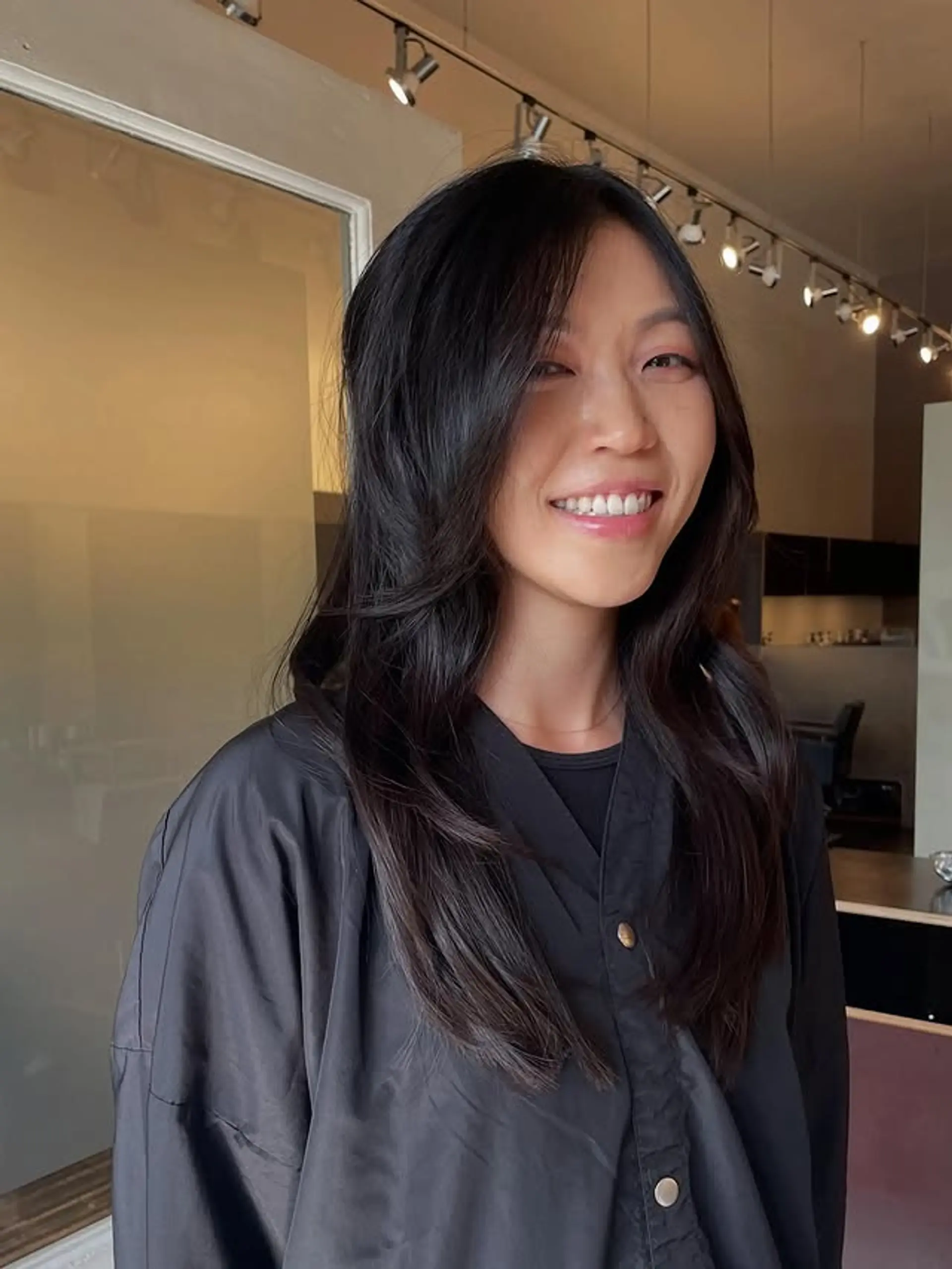 A long shag haircut with face-framing layers. 1