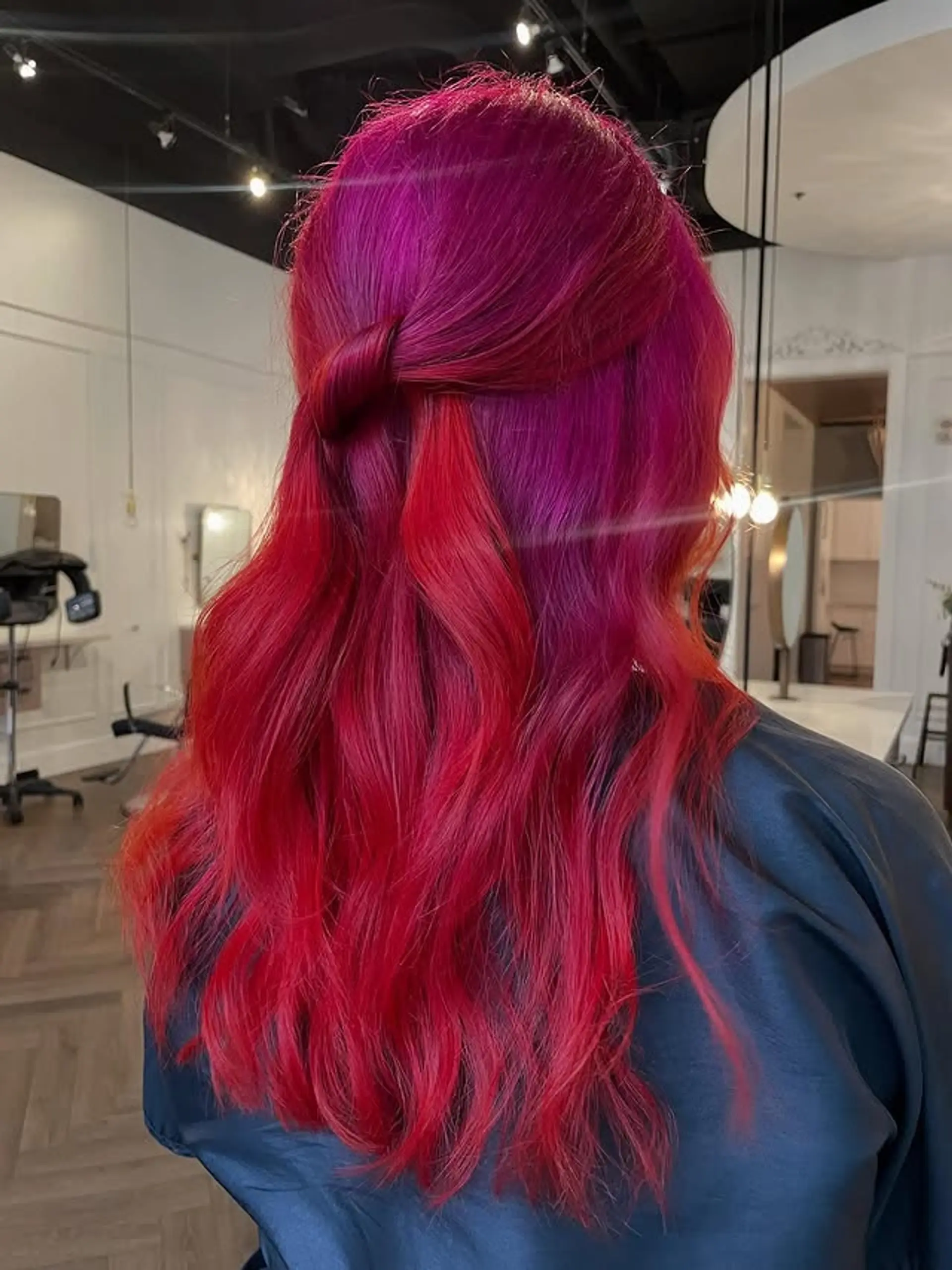 A medium-length wavy hairstyle with a twisted half-updo. 1