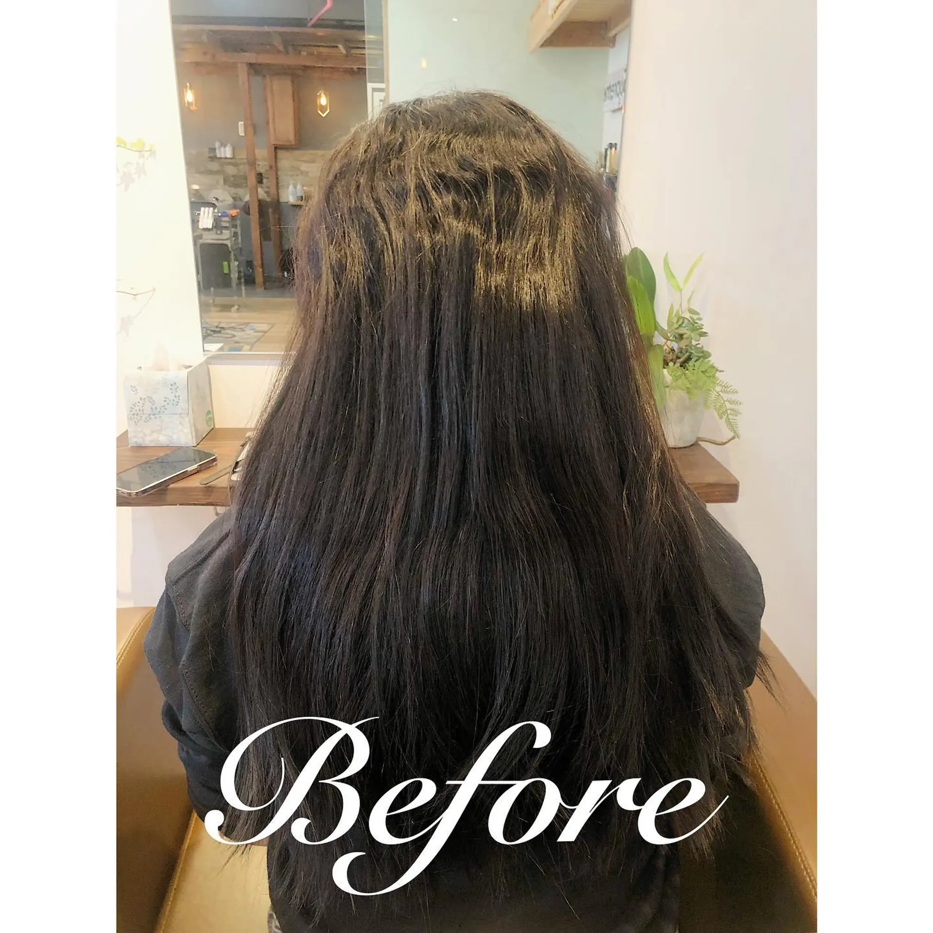 A super sleek, shiny, and straight long hairstyle that gives the appearance of glass. 3