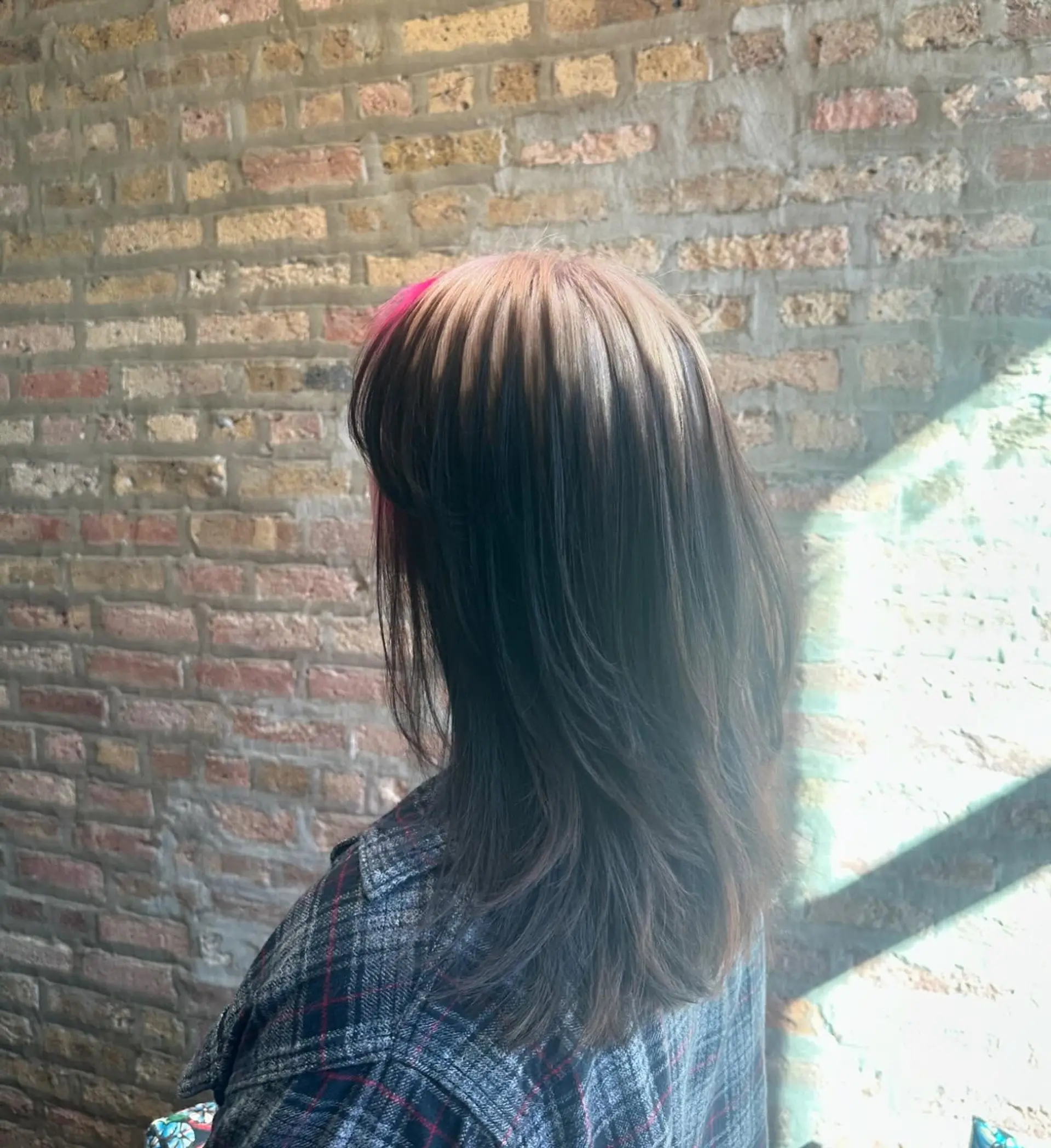 Long layered haircut with pink highlights on top and blonde balayage. 2