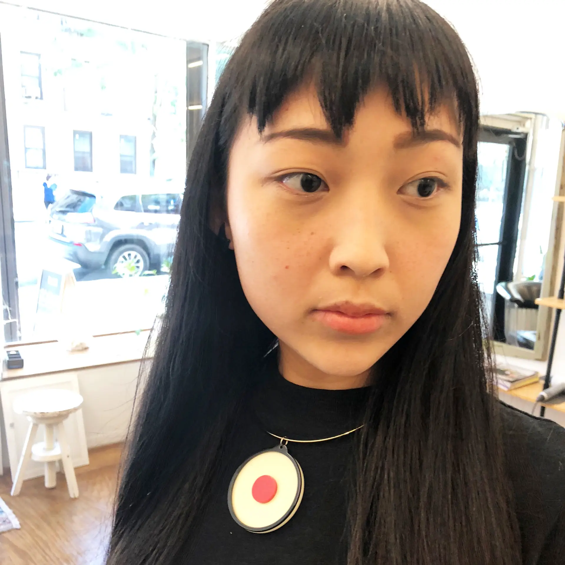 Long, straight, black hair with zig-zagged bangs falling just above the eyebrows, creating a fun look. Inspired by the 1986 Japanese manga, Chibi Maruko-chan. 2
