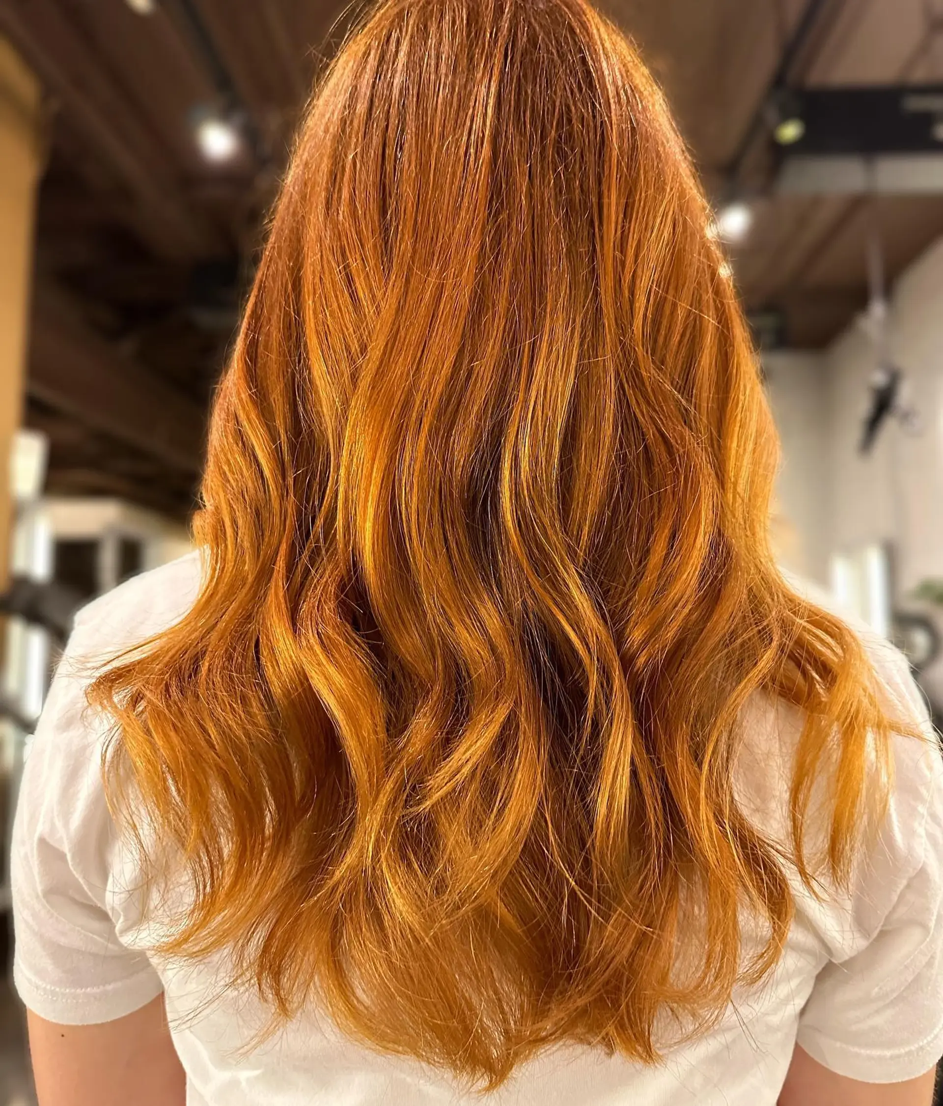 Long, flowing waves in a stunning copper hue. 1