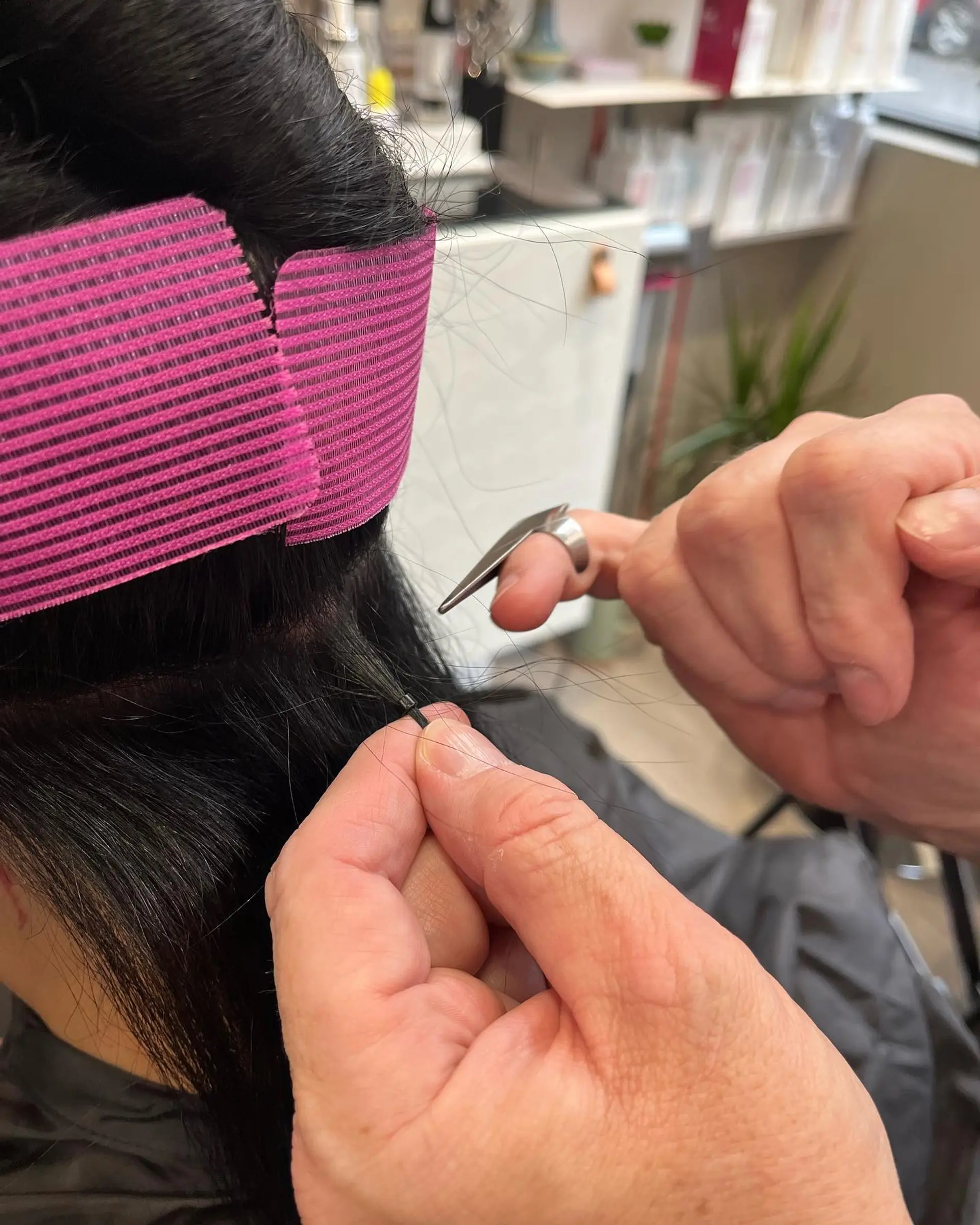 Long straight black hair with blunt electric blue bangs. 5