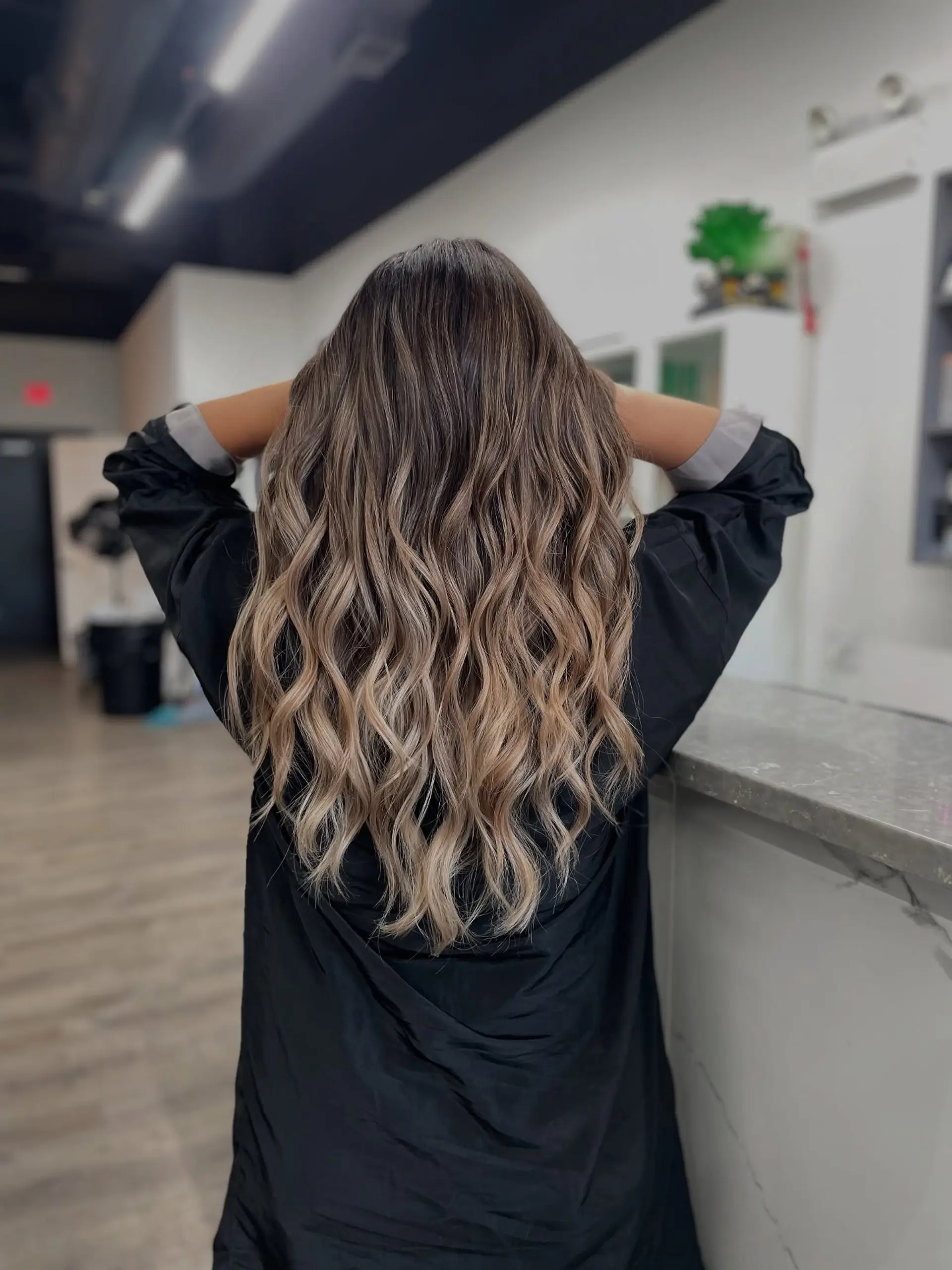 Long, wavy hair with a caramel balayage. 1