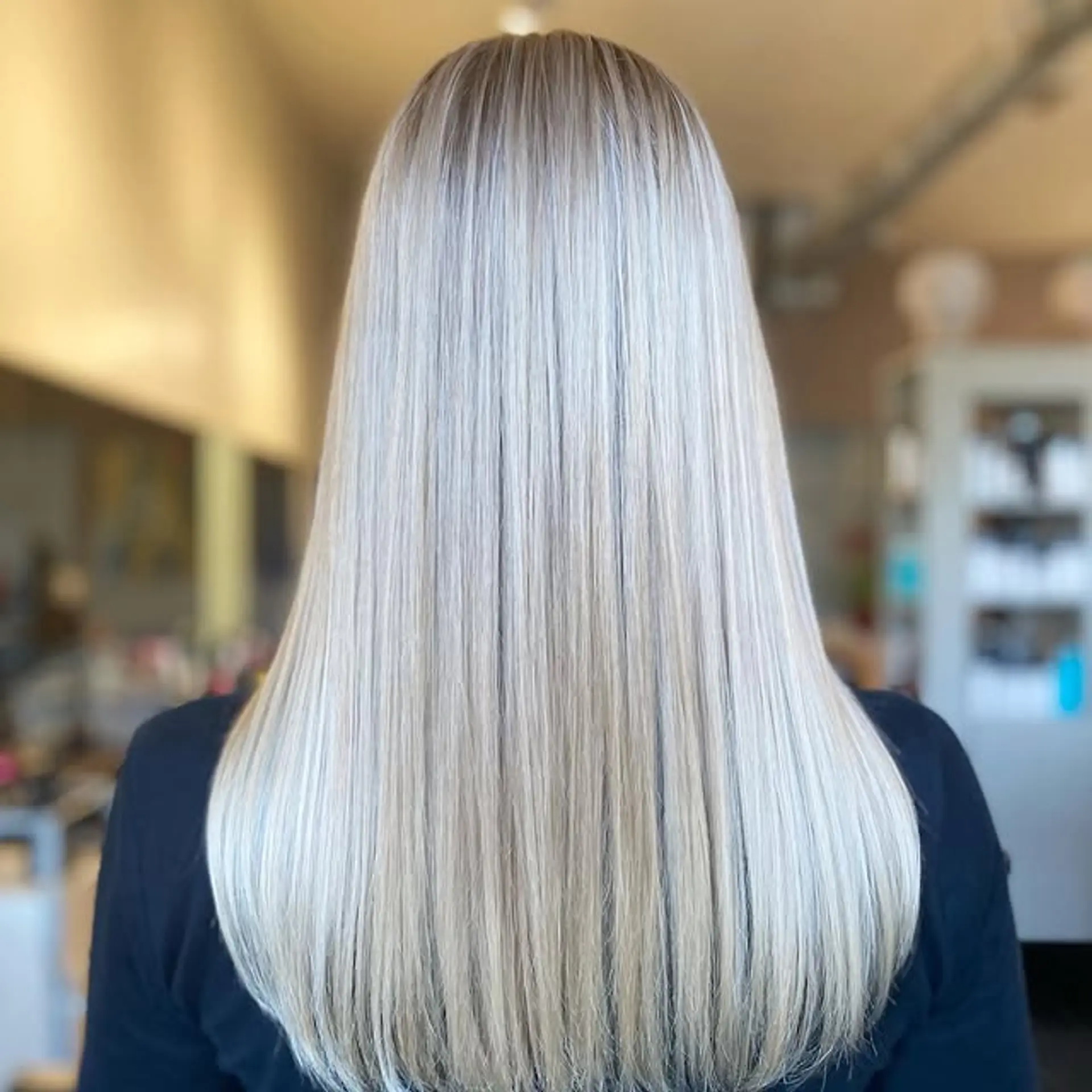 Long, straight platinum blonde hair with an icy tone. 1