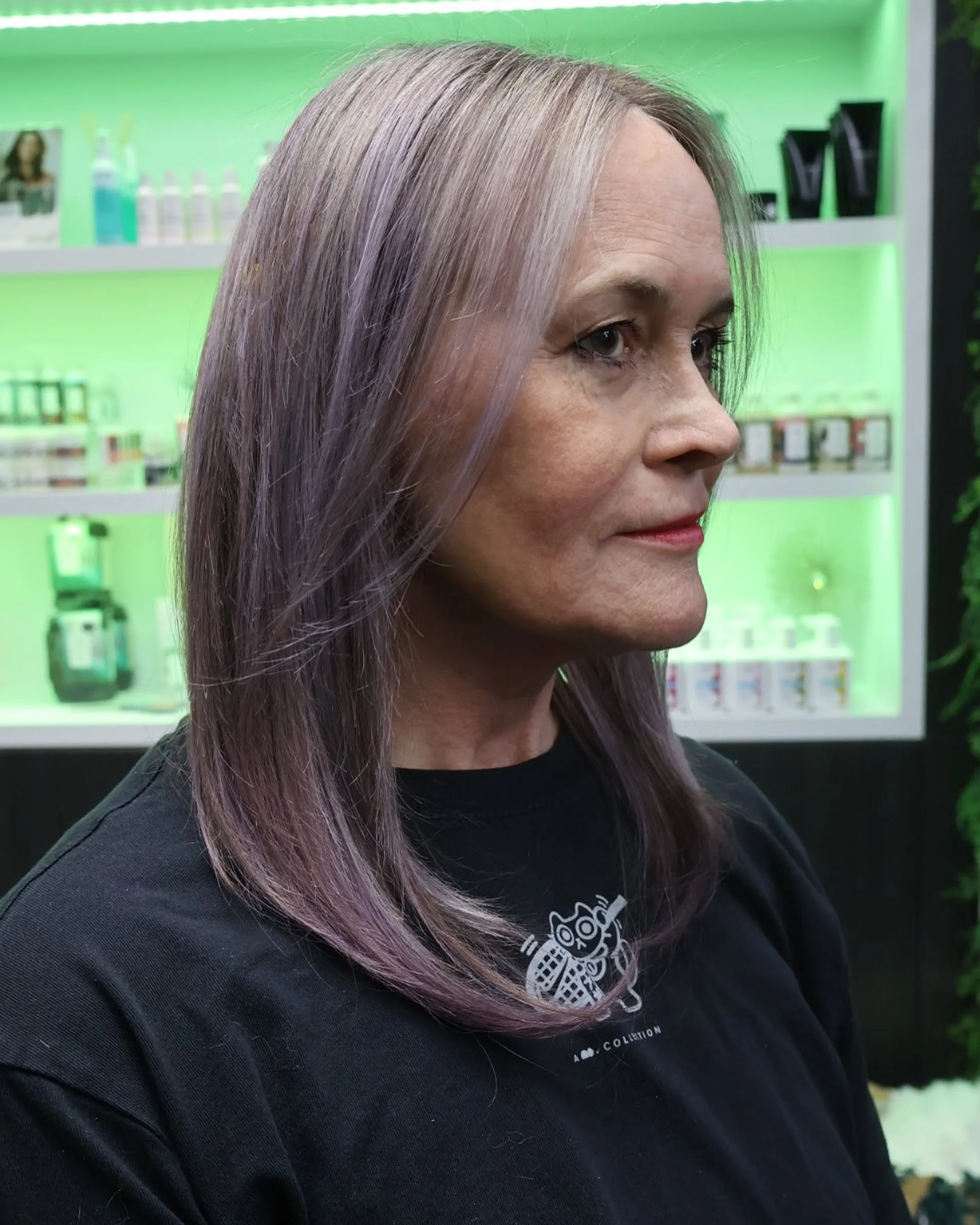 A model with long, sleek, straight hair dyed a vibrant pastel lavender, showcasing the Digital Lavender trend of 2026. - Preview 3