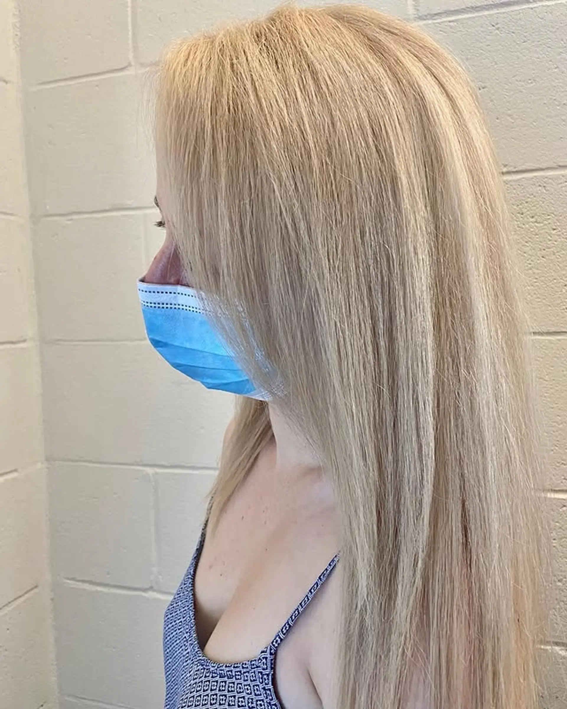 Long, straight hair with a cool, icy blonde color. 1
