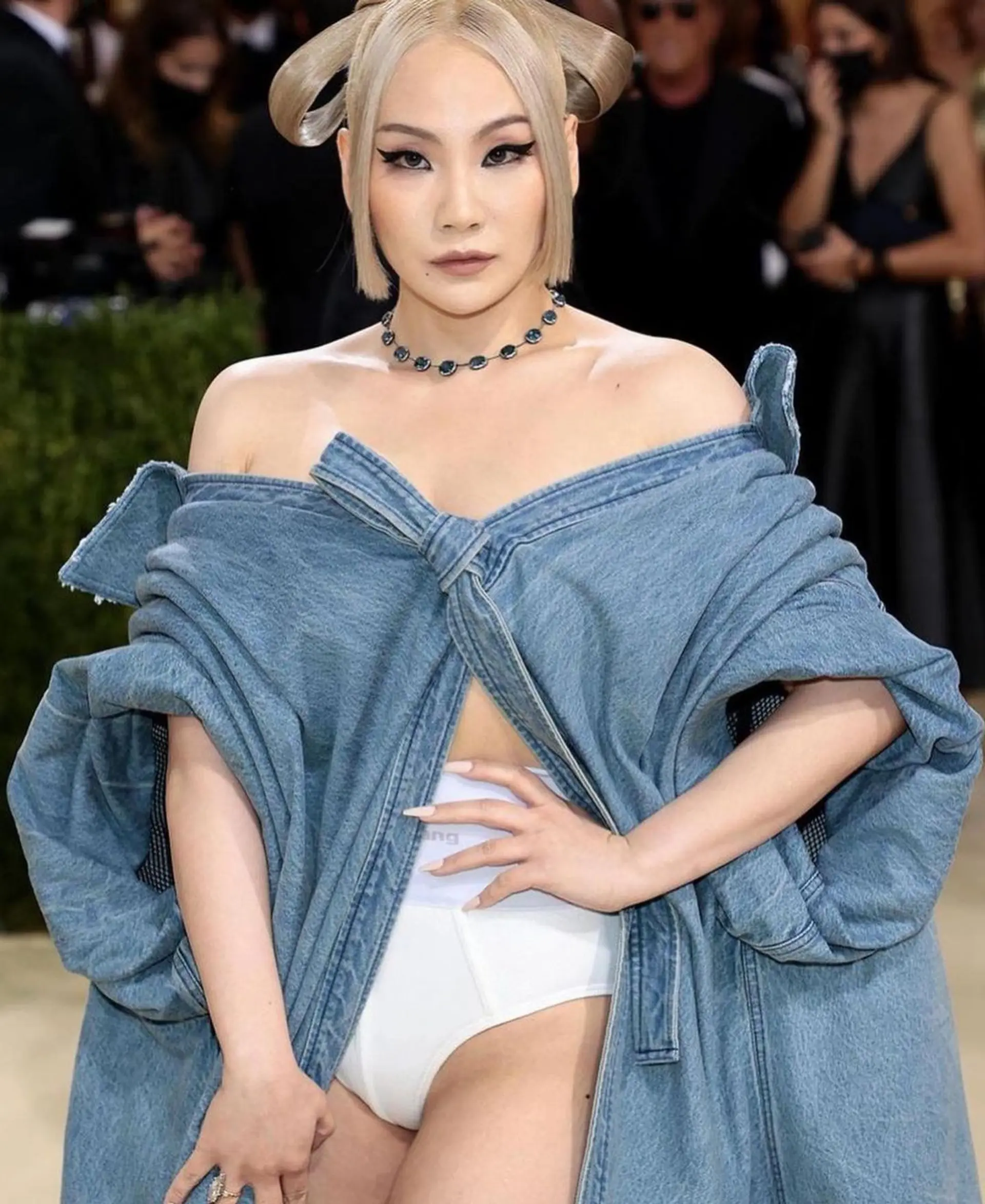 Hair designed for CL's look at Met gala 2021.
A sleek asymmetrical bob with a geometric high bun and a loop detail, featuring a platinum blonde color and a polished straight texture.  4