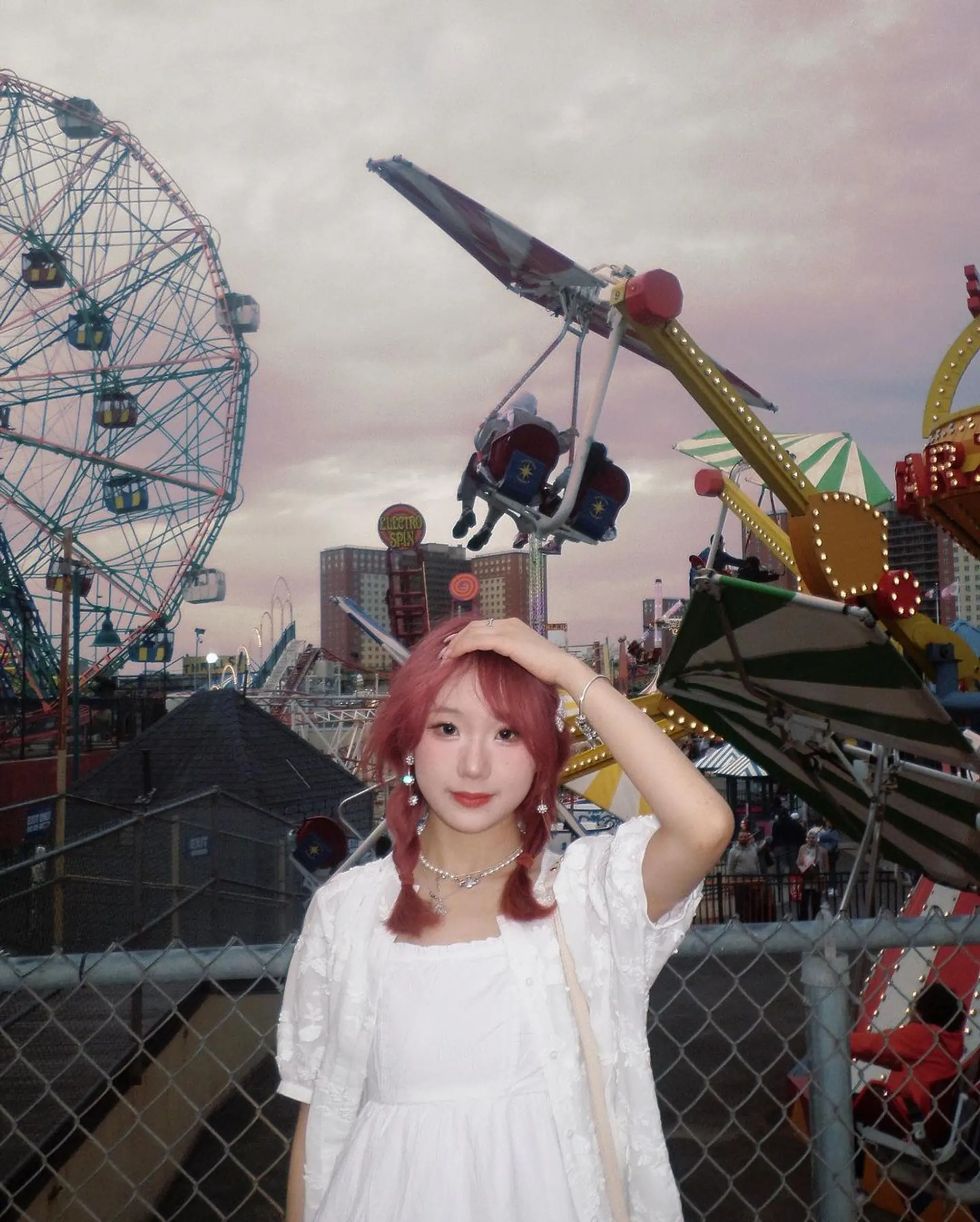 Medium-length, wavy pink hair with soft layers, fringed bangs, and two thin braids on either side, creating a playful and youthful look perfect for a teenager. 2