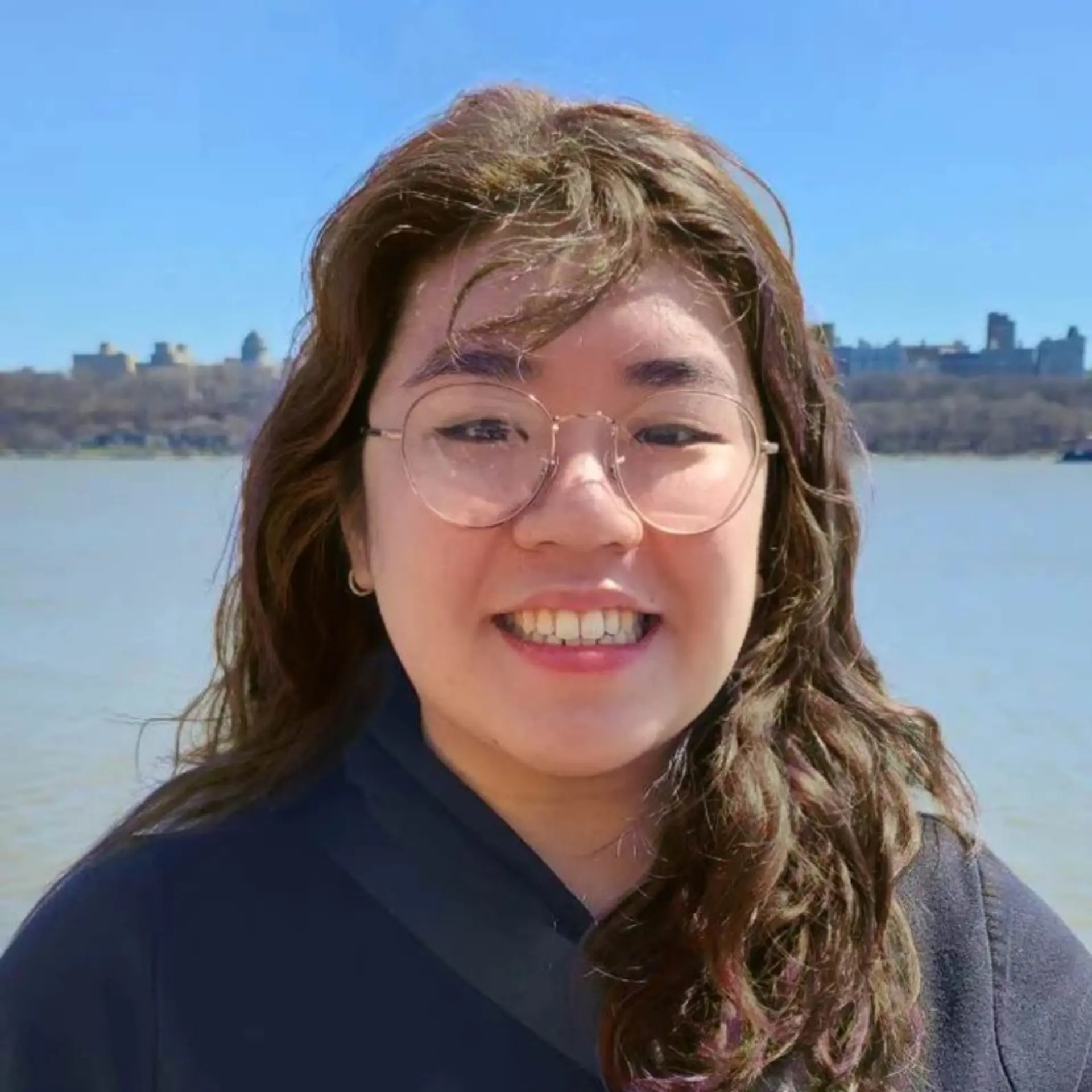 Long, wavy dark brown hair with natural waves and a wind-swept fringe, exuding casual elegance and understated volume. 1