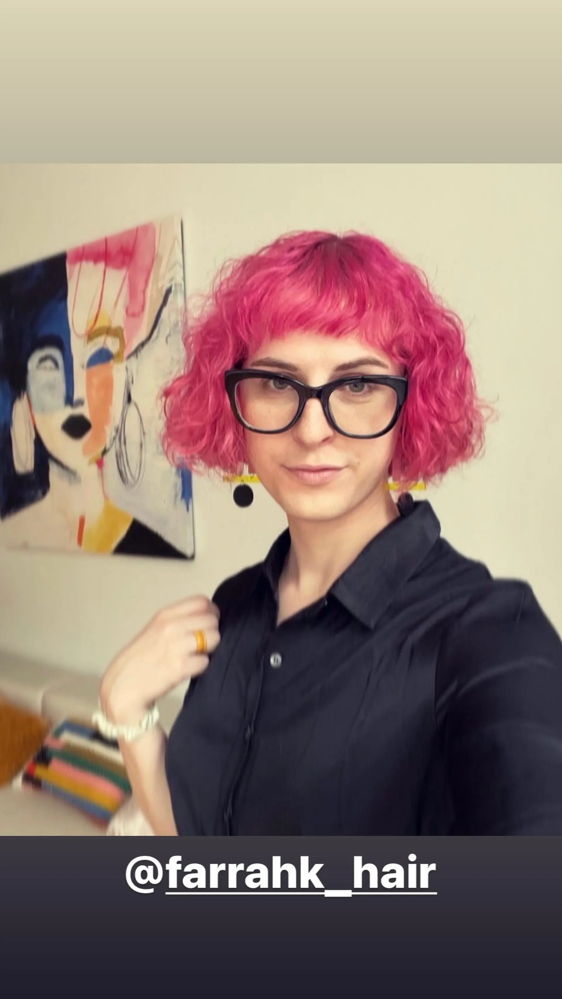 A stylish short pixie cut with tight curls and micro bangs. 1