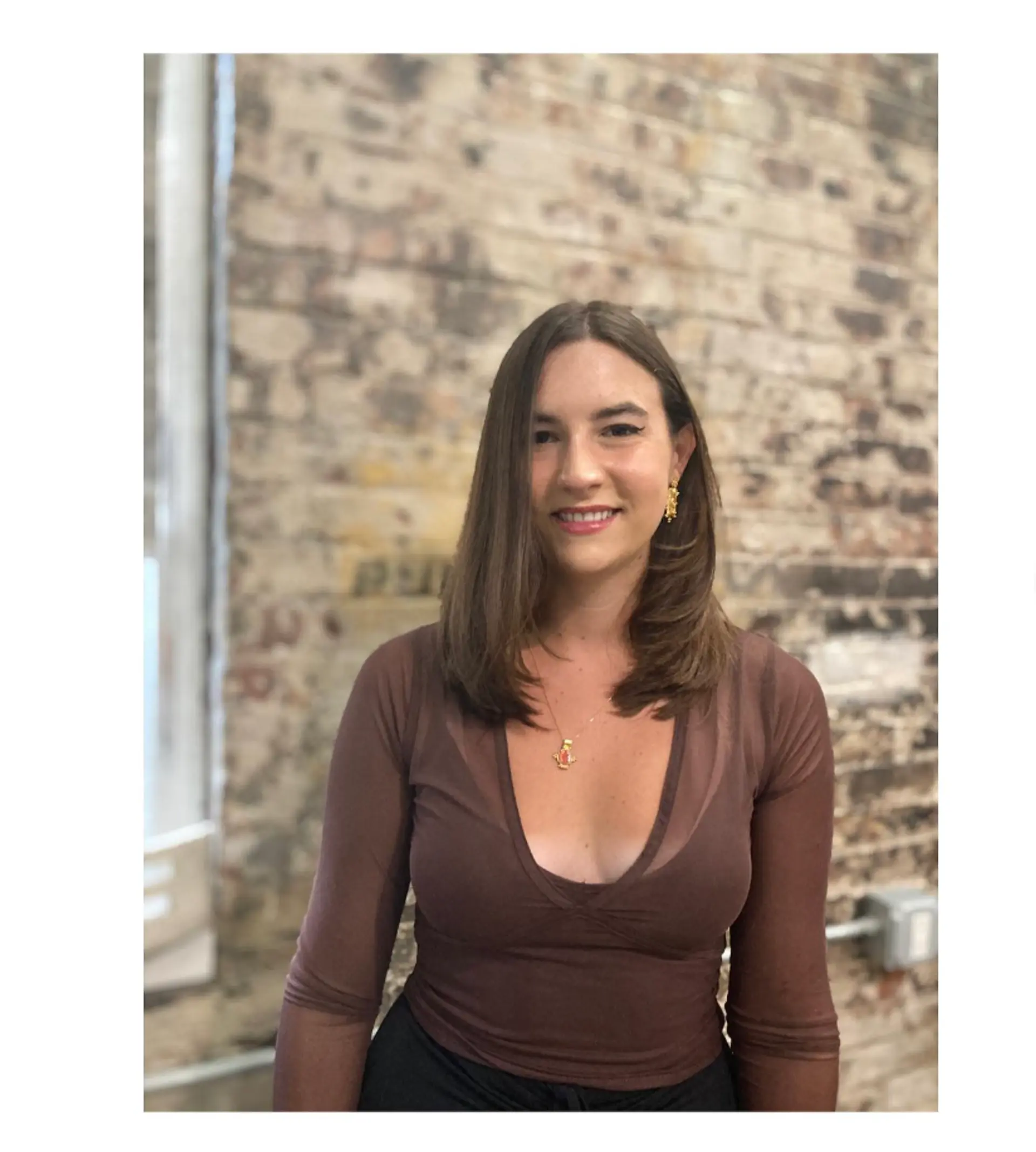 A classic medium-length haircut with subtle layers to frame the face. 1