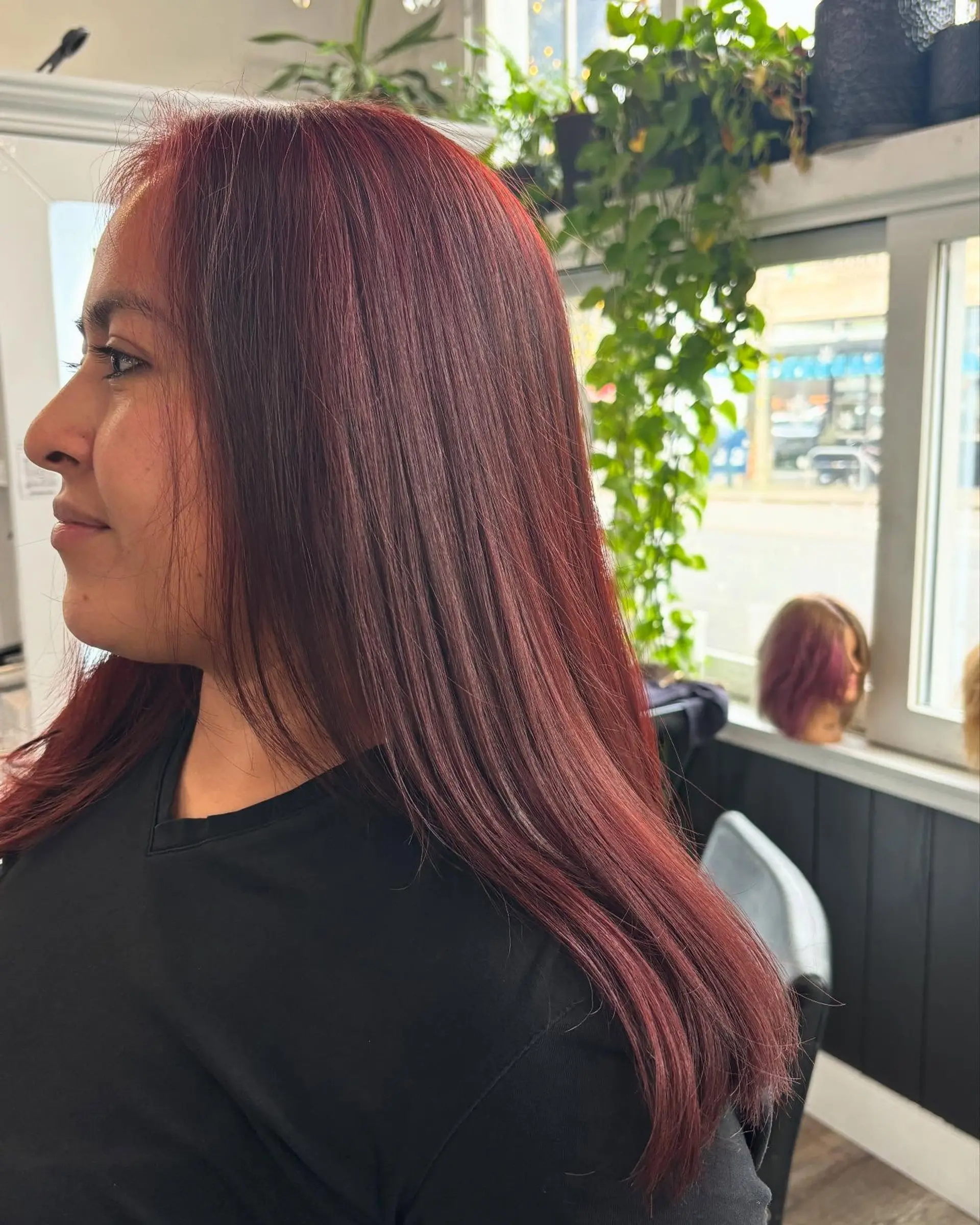 Straight, smooth long hair colored in a rich auburn-red tone with a polished finish. 1