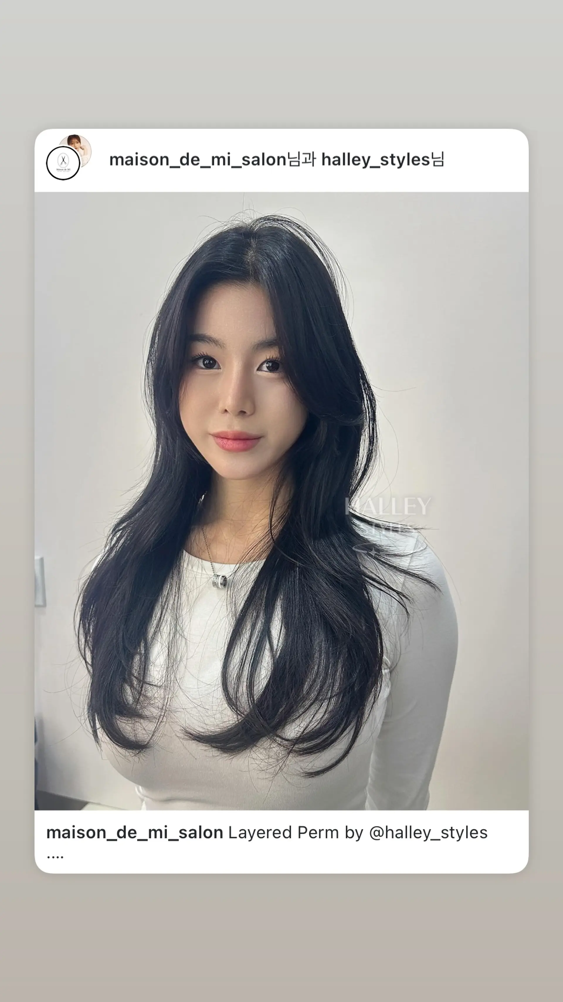 A flowy, long layered hairstyle with soft waves and face-framing layers. 1