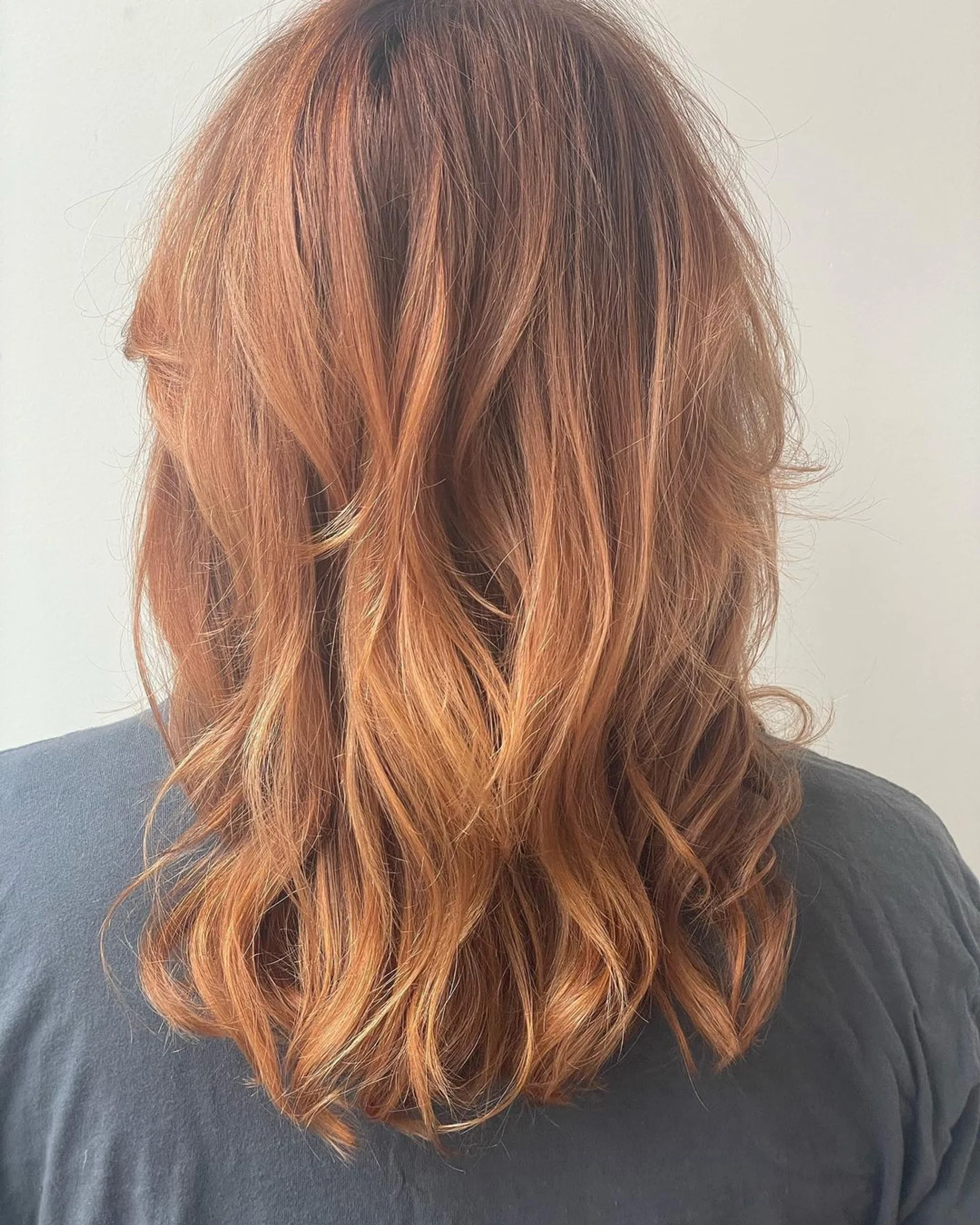 Modern shag haircut with curtain bangs, a popular trend in NYC - Preview 2