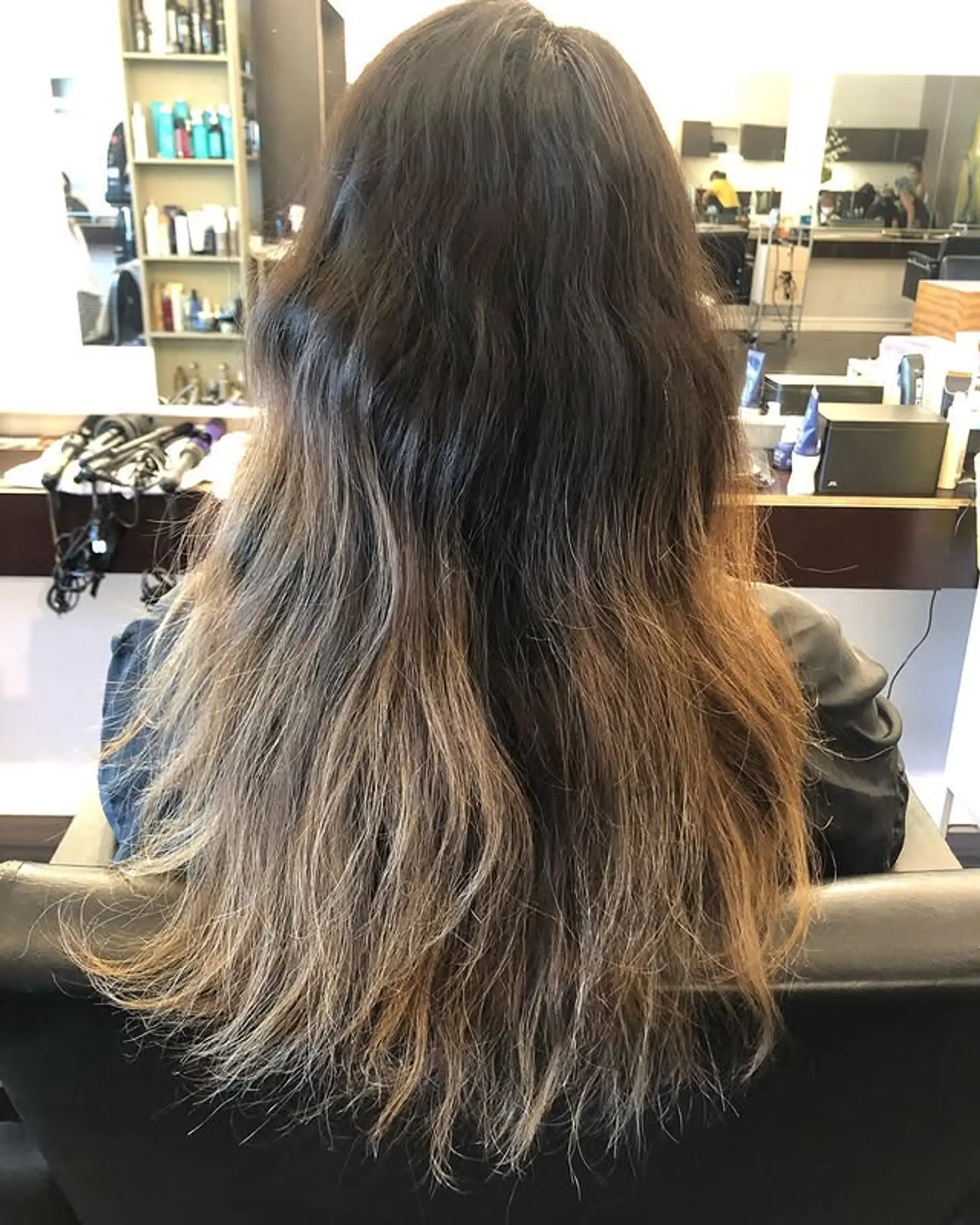 Long layered cut with a balayage color. 1