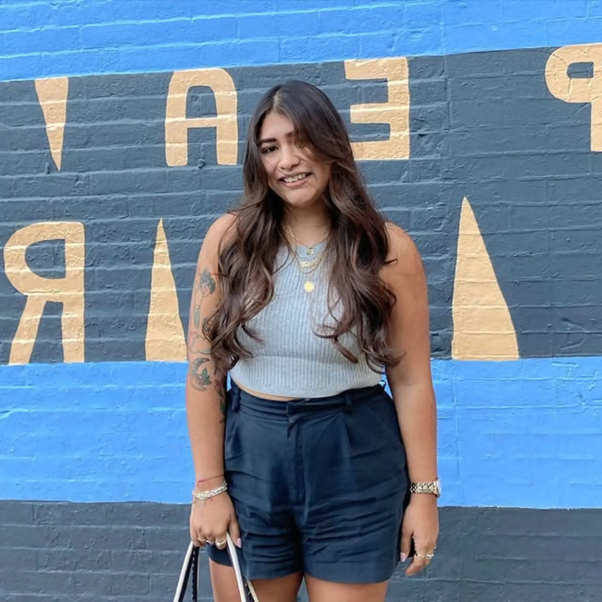 A long, layered haircut with a voluminous blowout and face-framing layers. 1