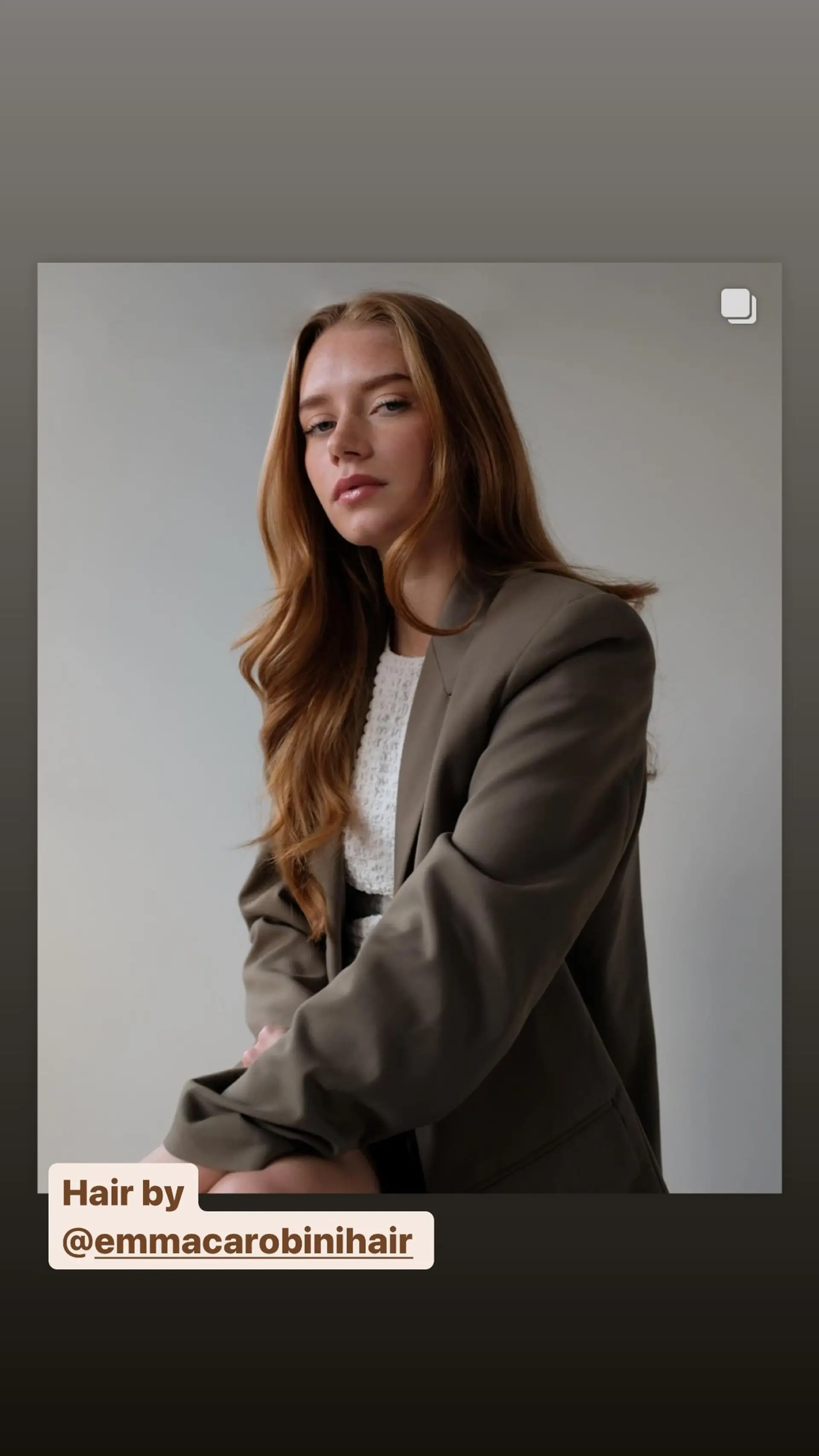 Long wavy auburn hairstyle with face-framing layers. 1