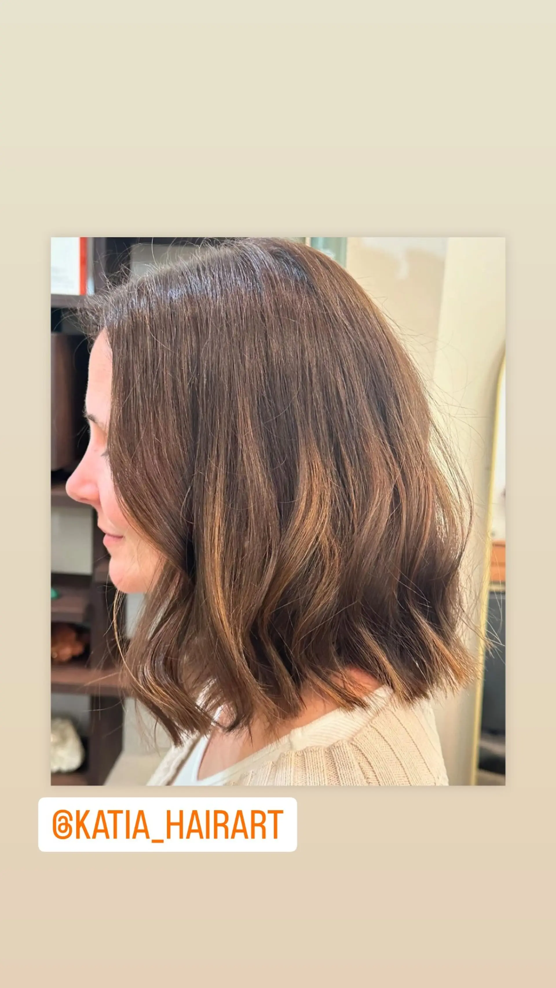 A stylish, wavy bob with subtle highlights. 1