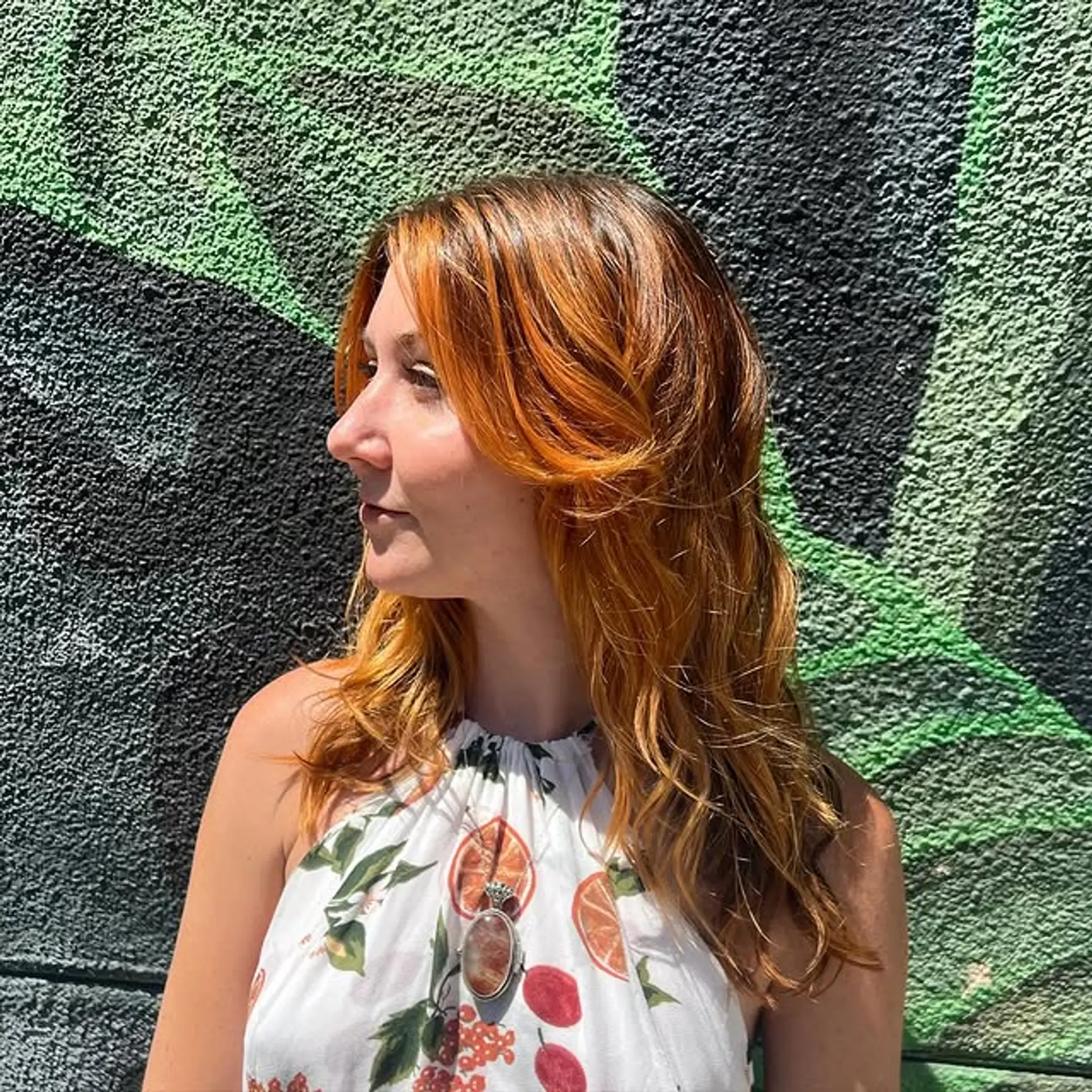 A long, layered cut with wavy texture and face-framing layers. 1