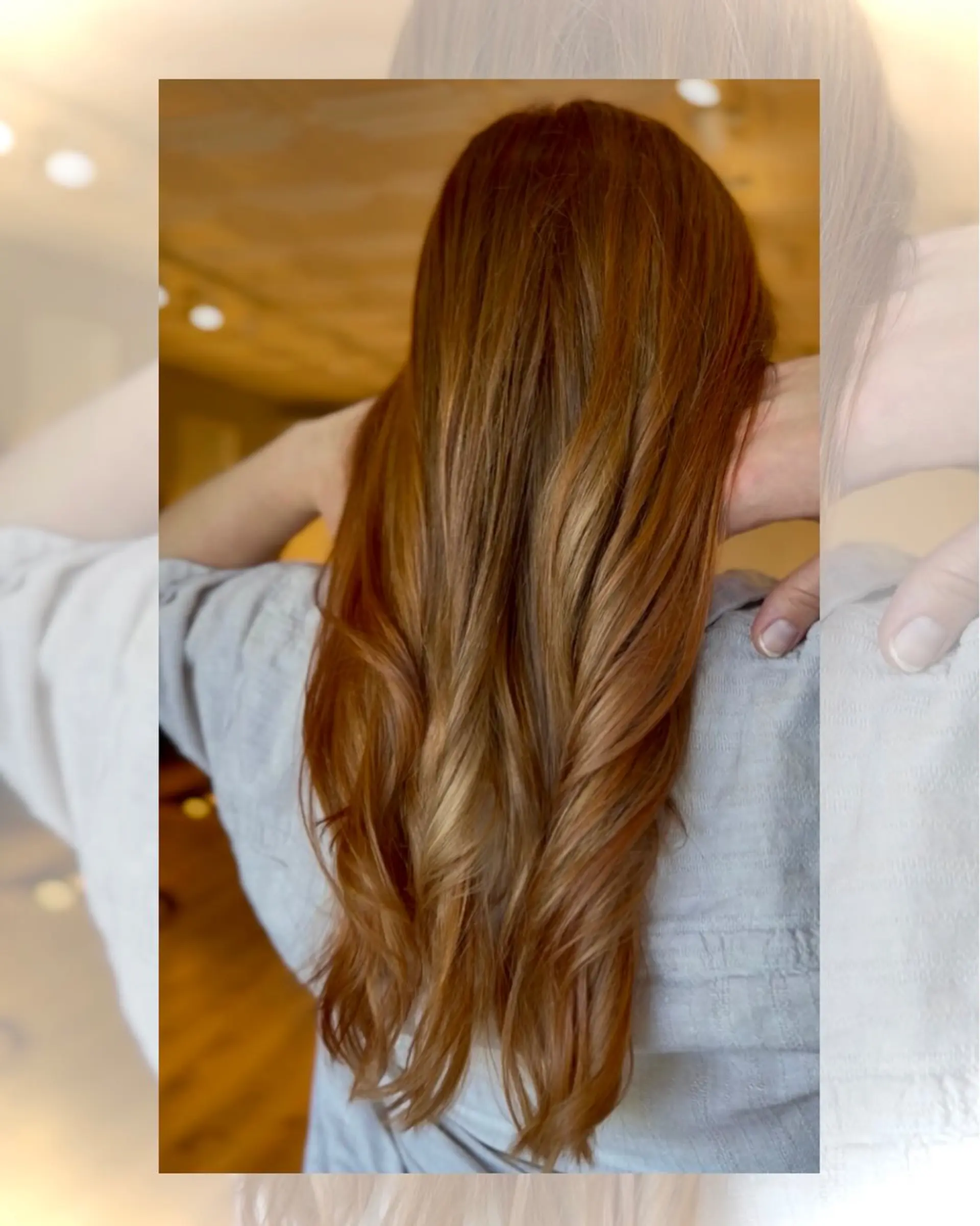 Vibrant warm copper hair with seamless dimensional highlights falling into soft waves at the ends. 1
