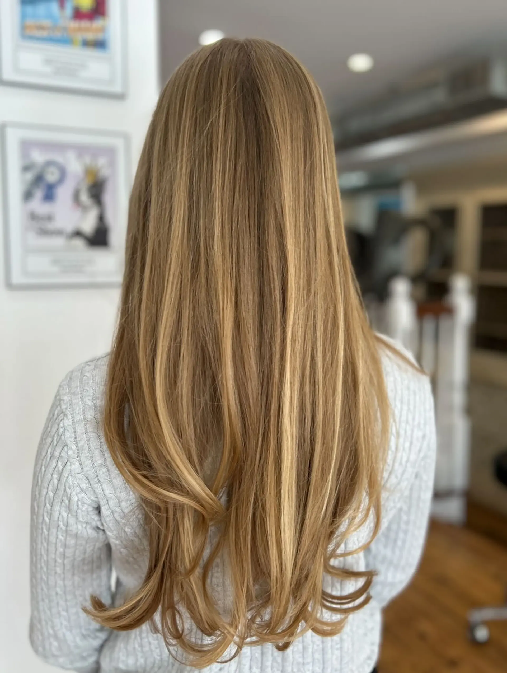 Long wavy hair with a seamless balayage, perfect for a beachy, sun-kissed look. 8
