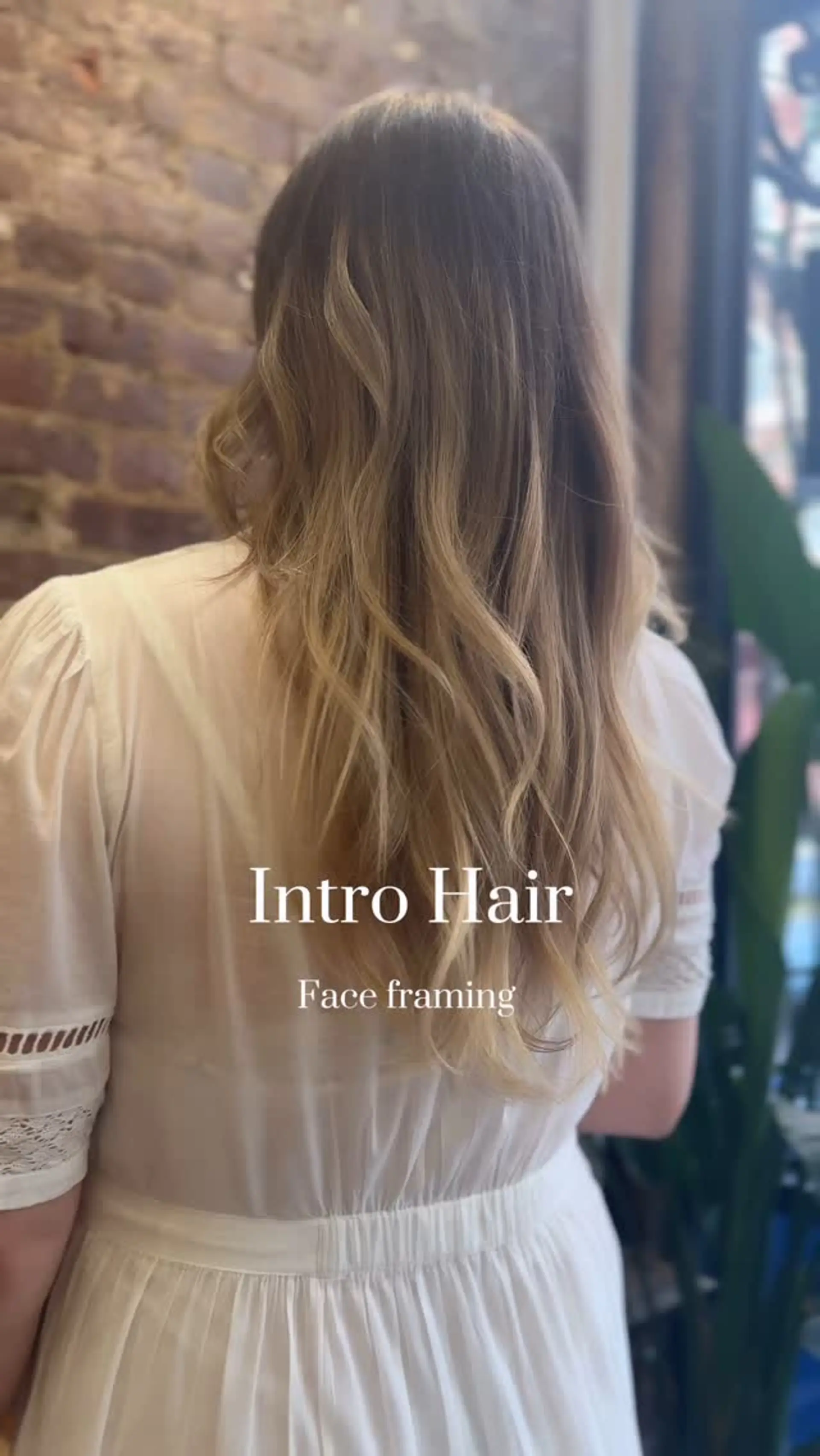 Long hair featuring a blonde balayage blend styled in loose, flowing waves. 1