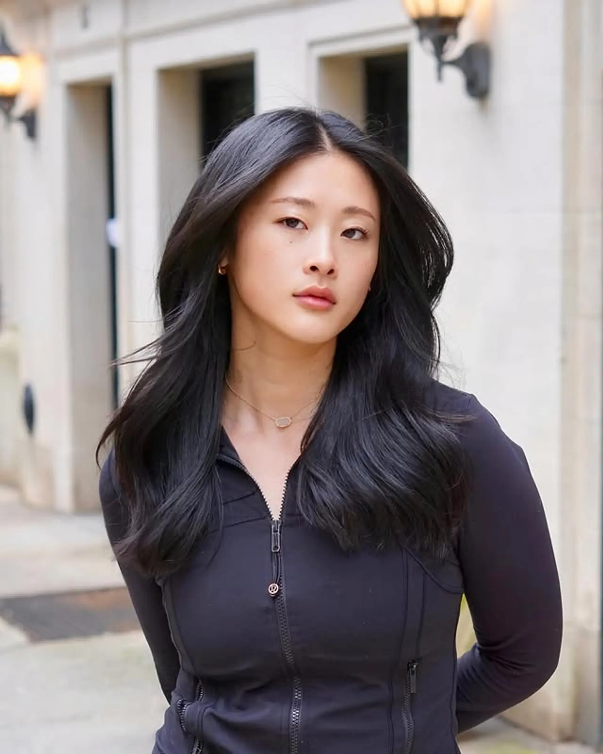 Long wavy hair with layers that frame the face. 1