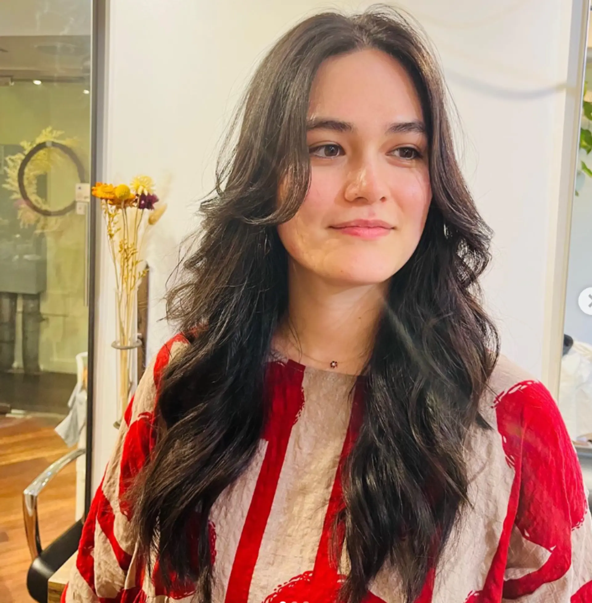 A long, layered shag haircut with feathered layers around the face. 1