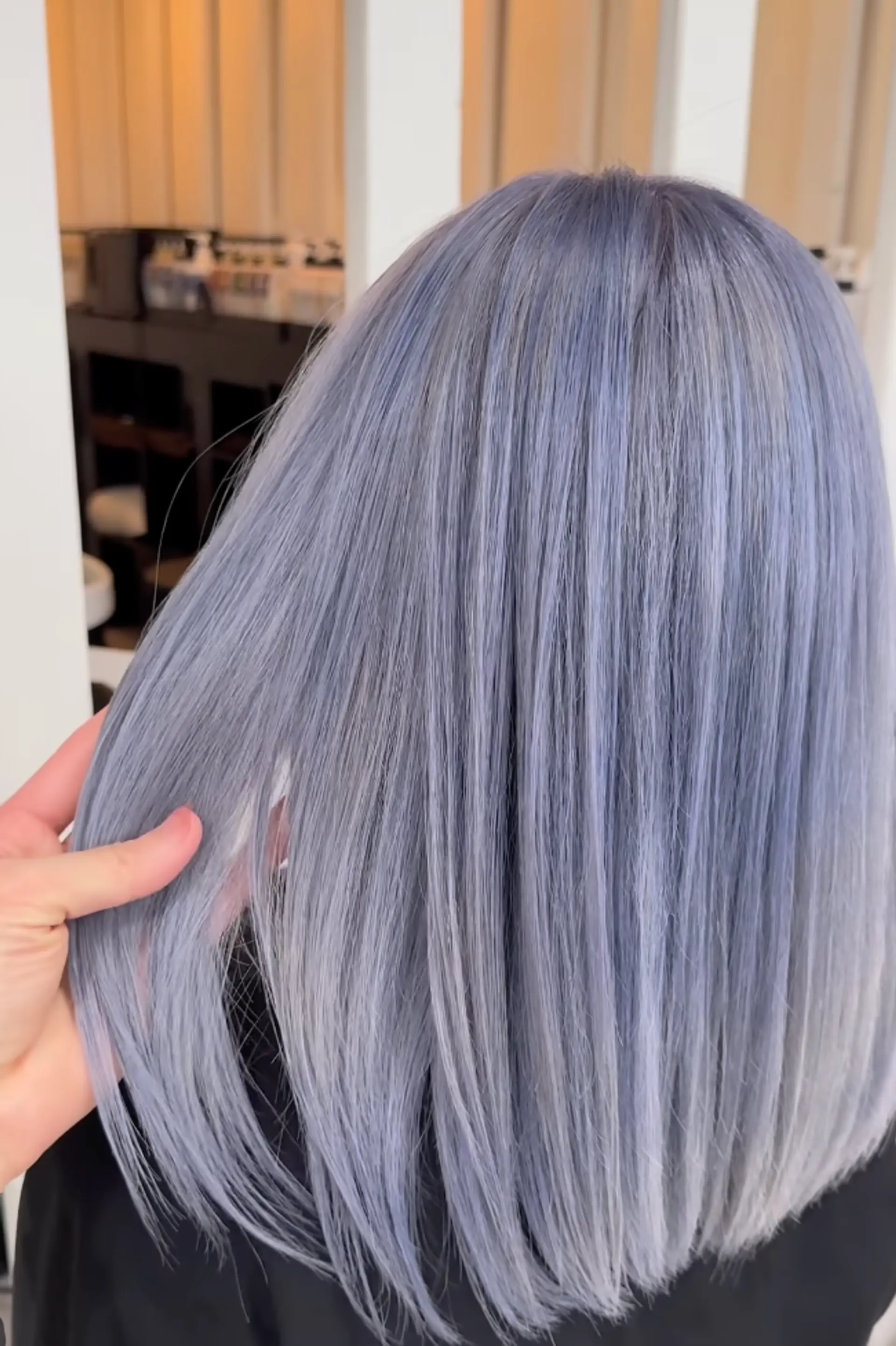 A sleek, medium-length, straight, silver-gray hairstyle with a metallic sheen and smooth texture arranged in even lines.

Stylist: @masaki.newyork 1