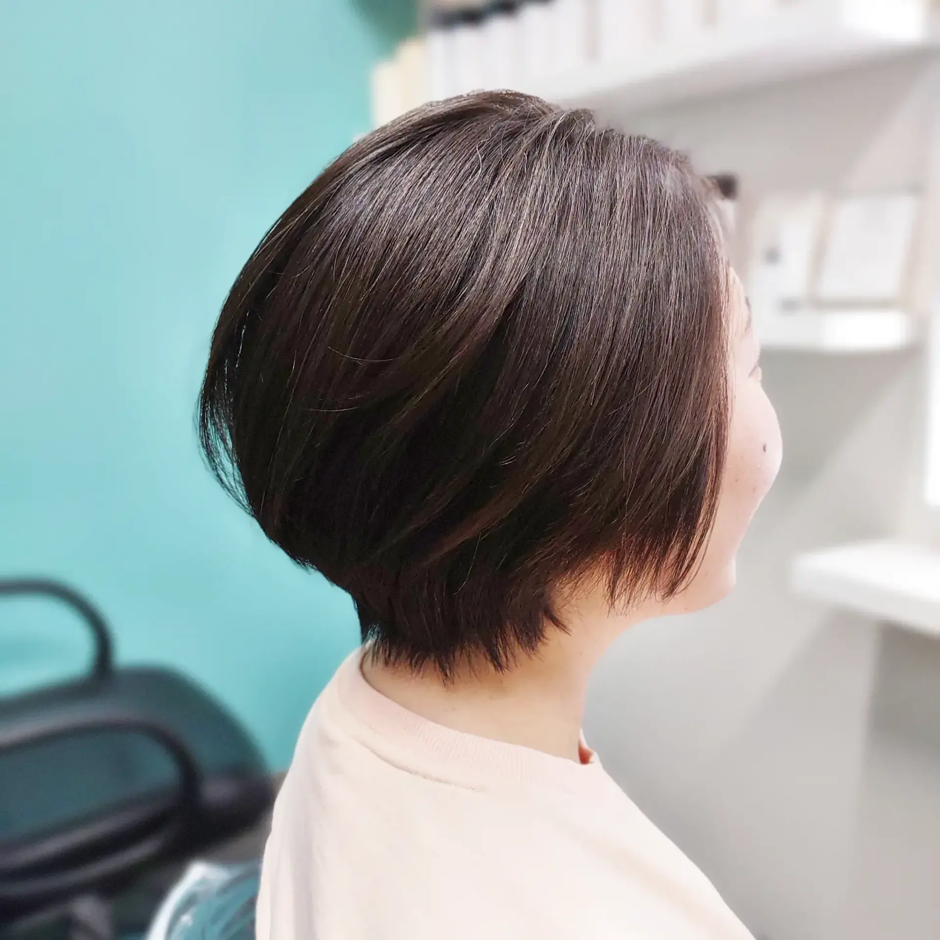A sleek, rounded short bob with subtle layers and a softly tapered nape. 1