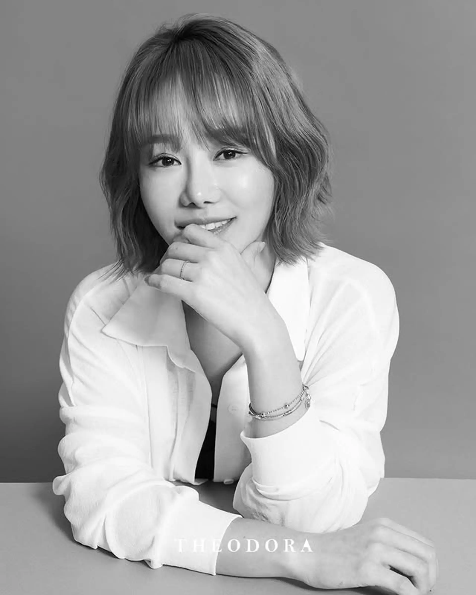 A shaggy bob with blunt bangs and wavy texture. 1