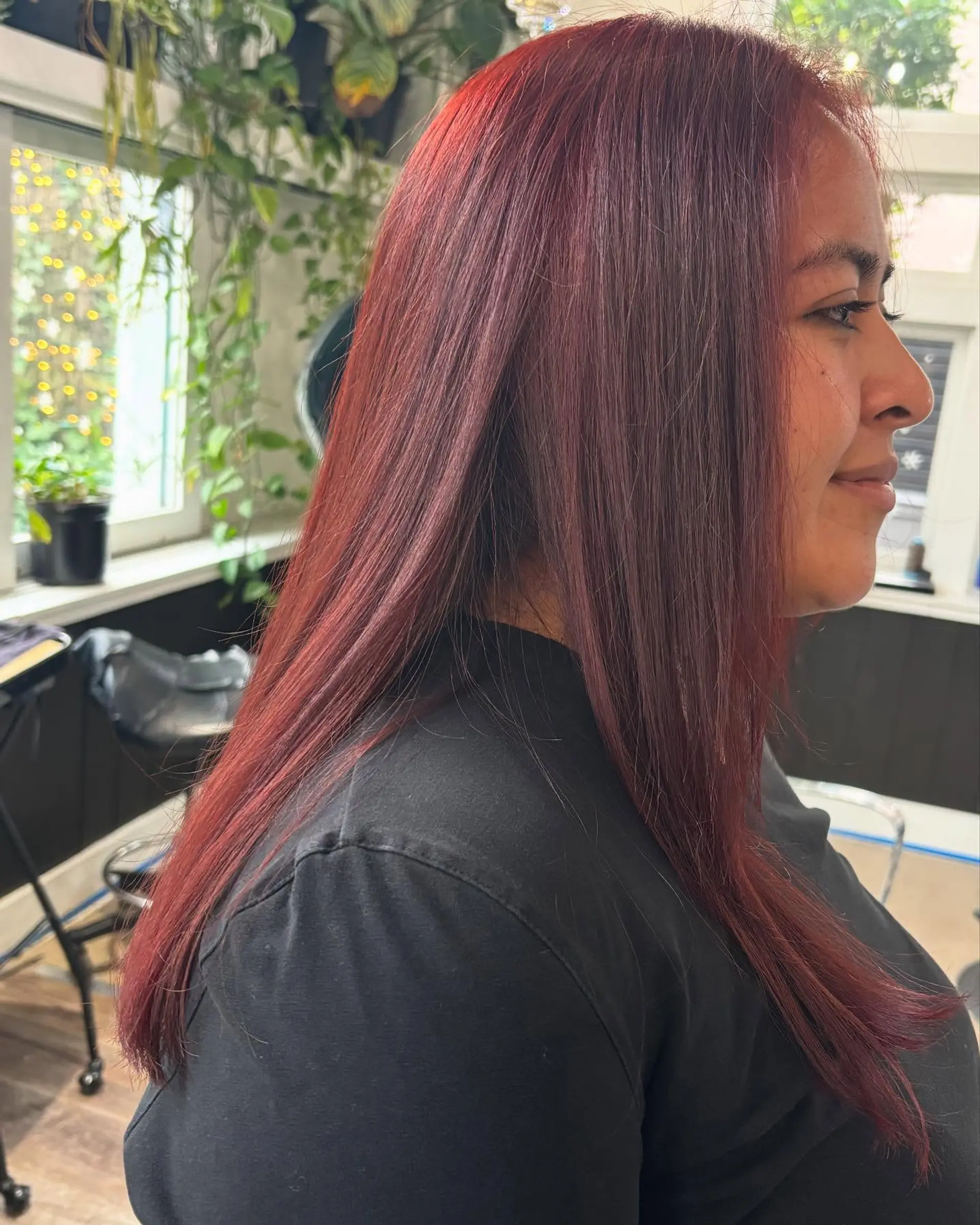 Straight, smooth long hair finished in a rich, vibrant all-over burgundy red hue. 1