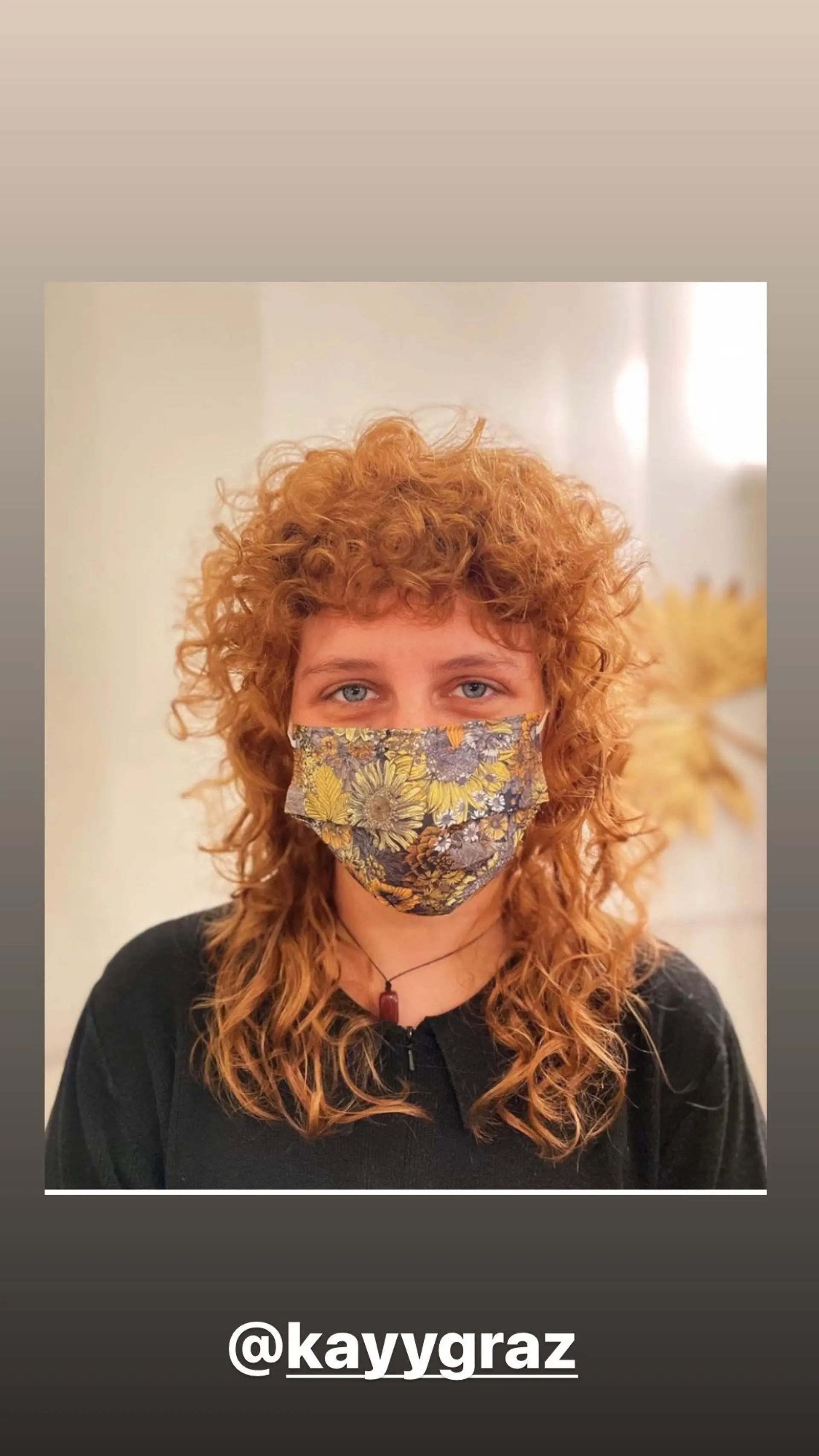 A shaggy, layered wolf cut with curly bangs, designed to enhance natural texture and volume. 1