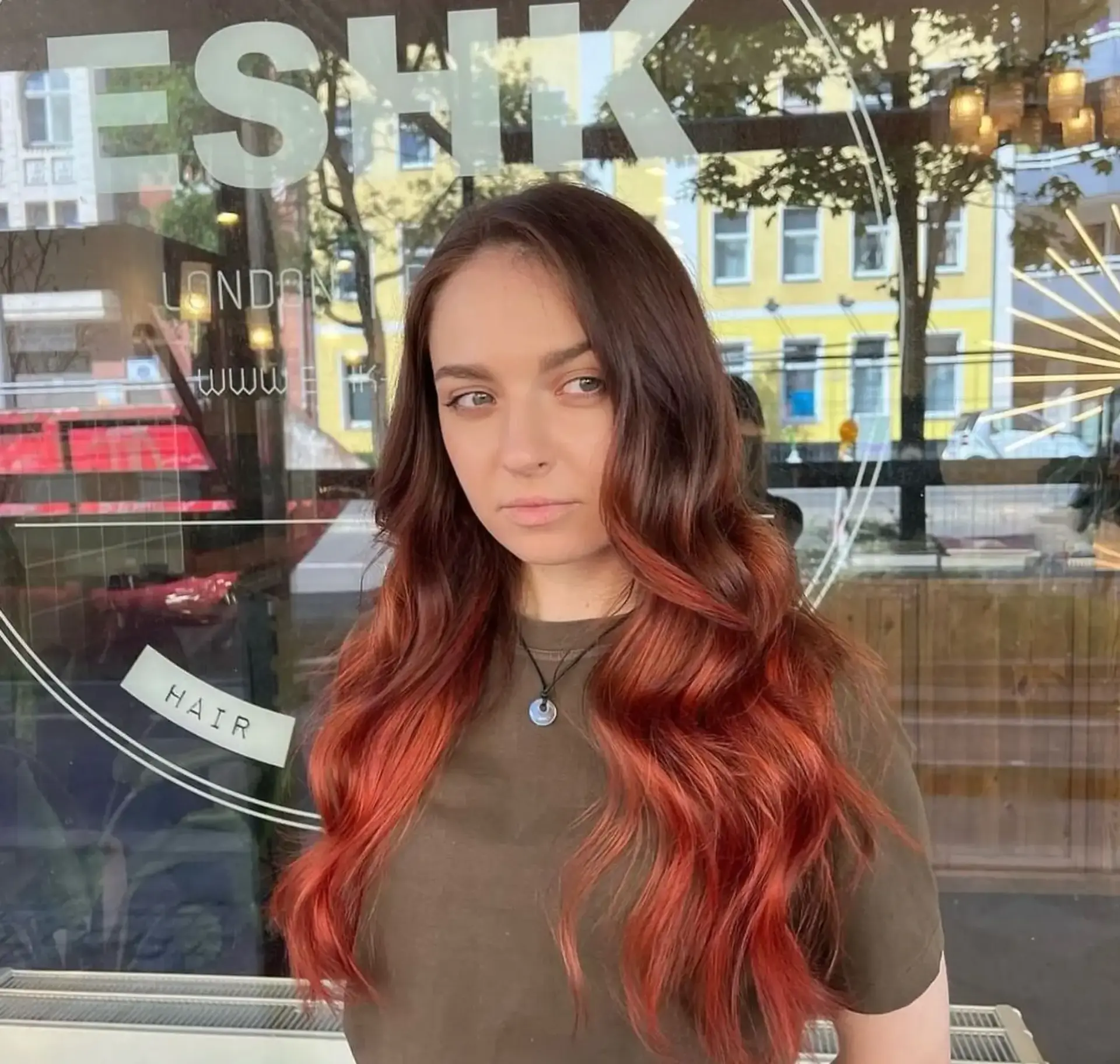 Very long, wavy hair with a dark brown to copper red ombre transition. 1