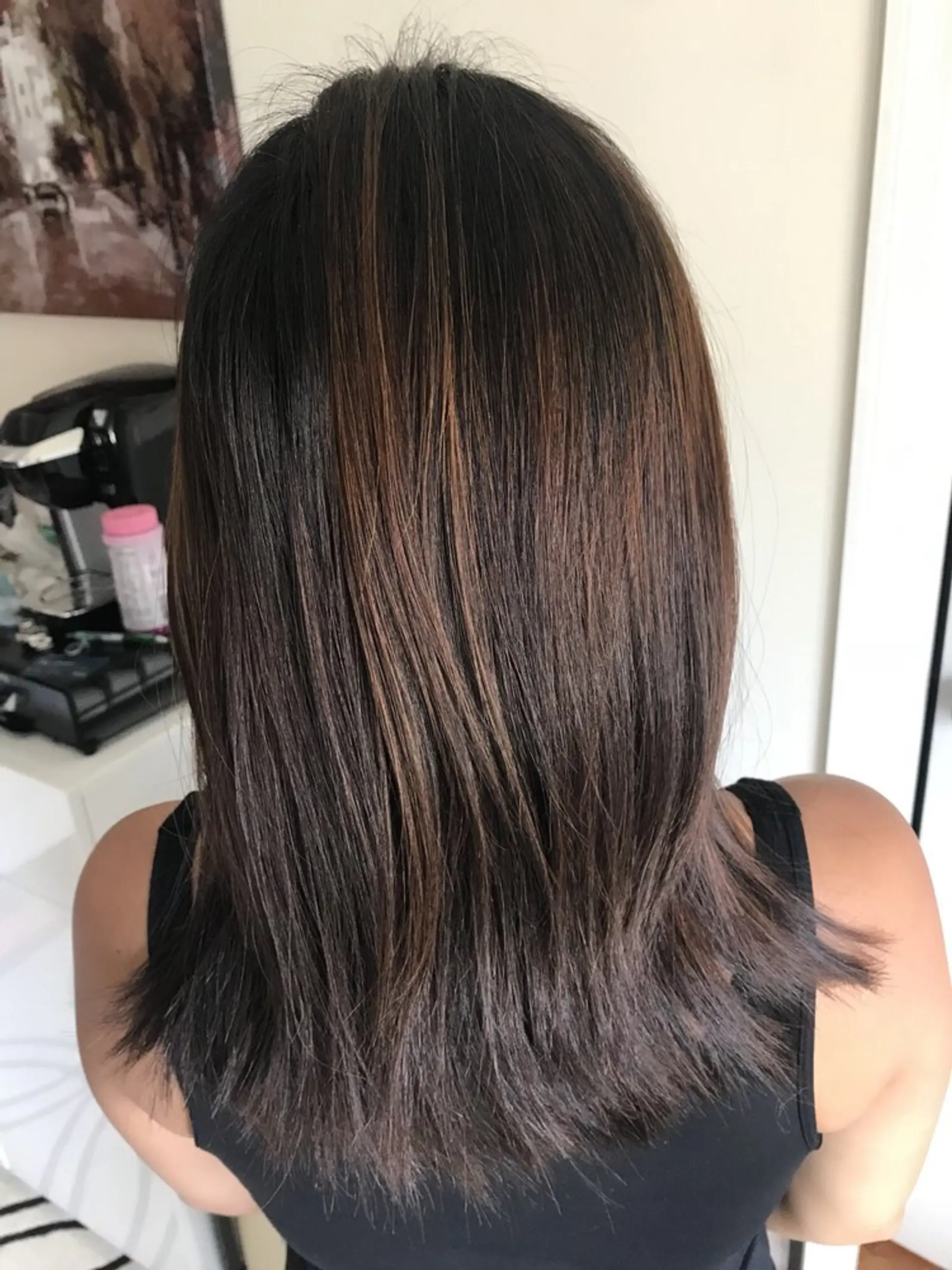 A medium-length lob with subtle auburn balayage highlights. 1