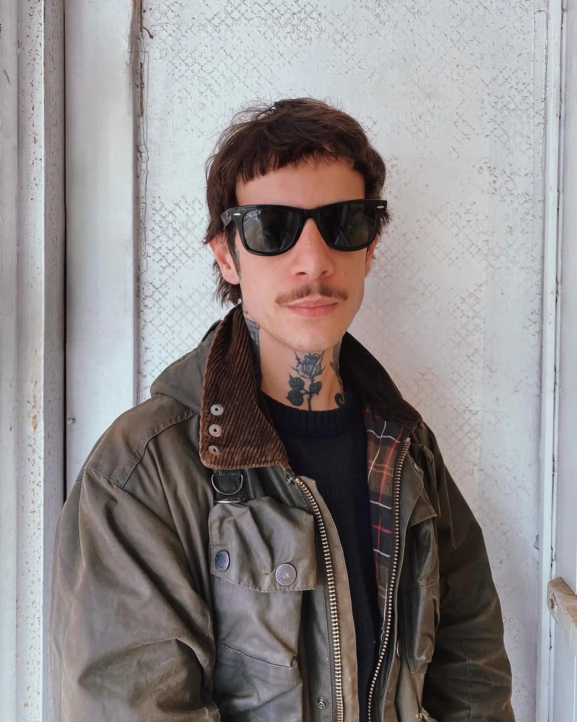 A textured, short chop with a messy fringe and layered sides, embodying a casual yet edgy vibe. 2