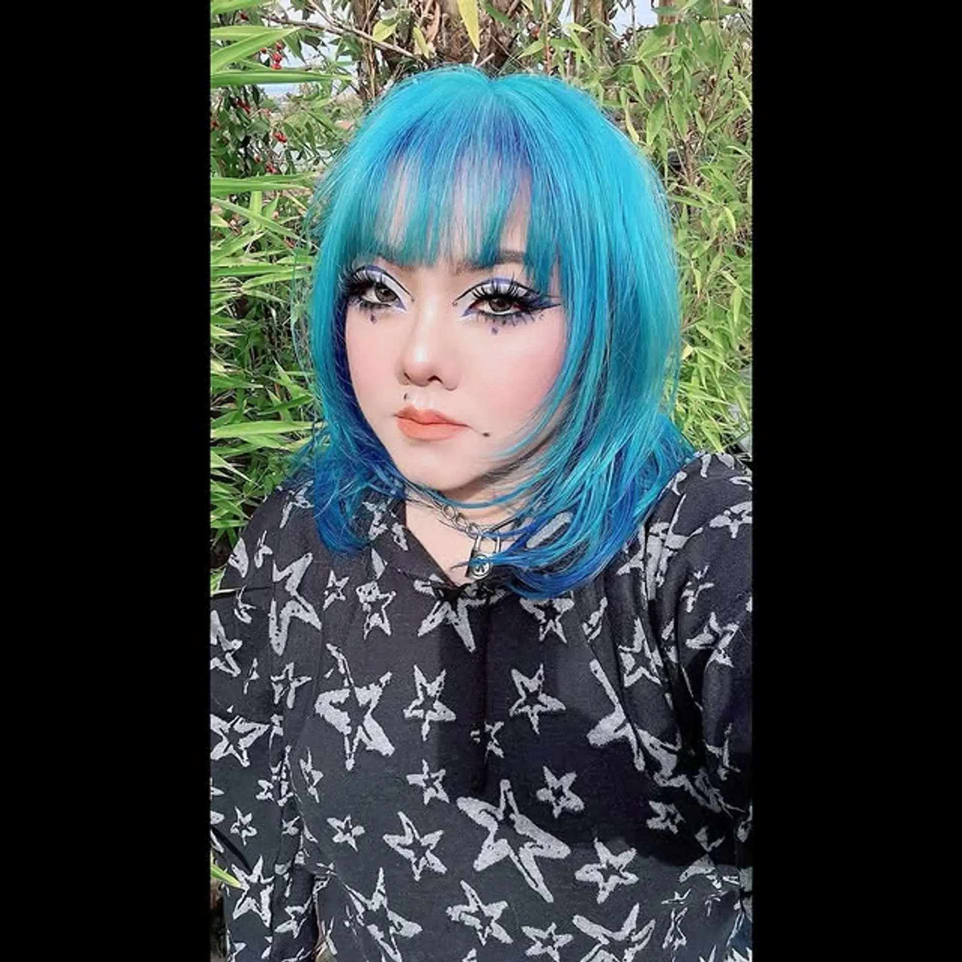 A striking electric blue bob with blunt bangs. 1